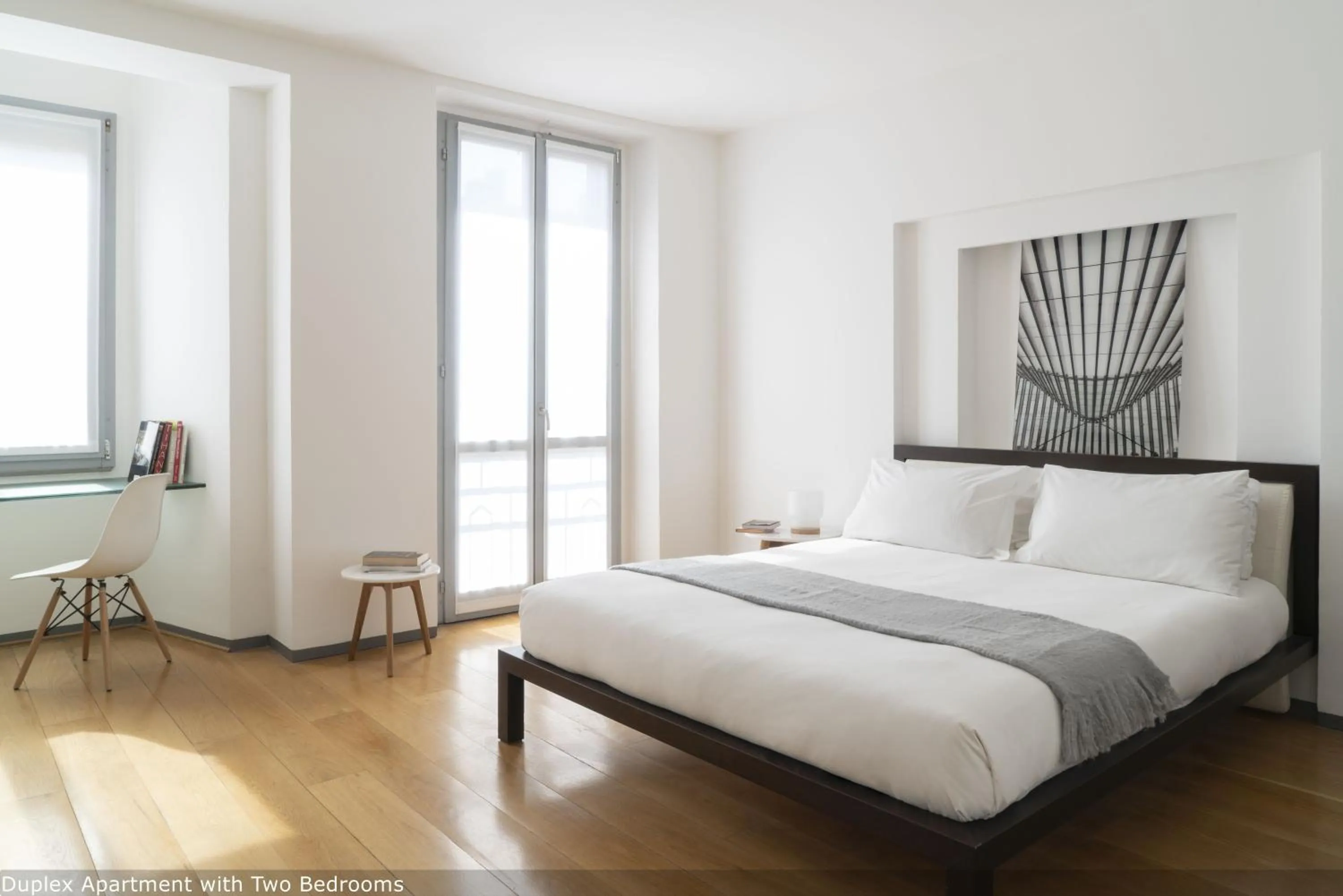 Bed in Brera Apartments in San Fermo