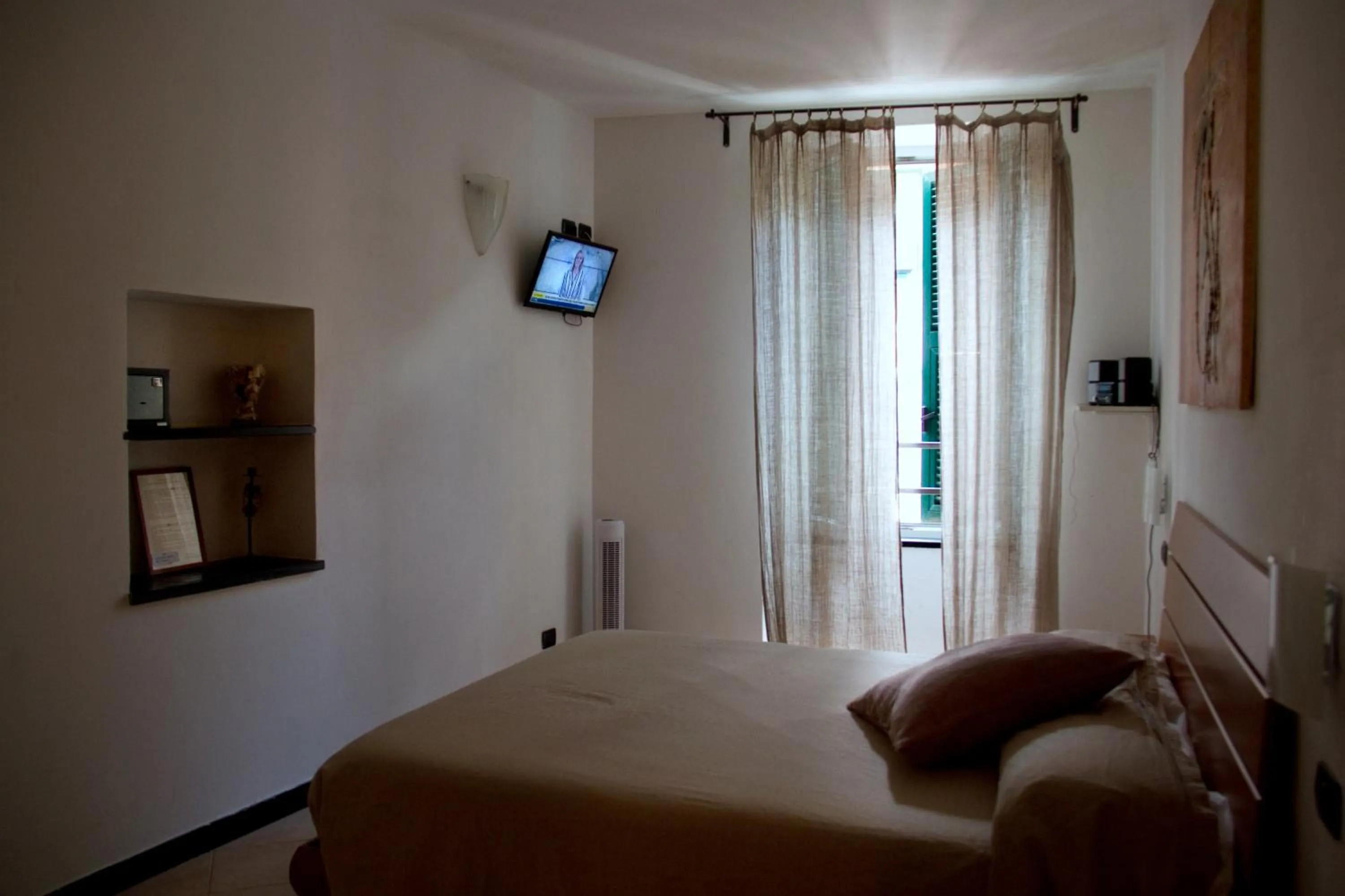 Bed in Affittacamere Rollando