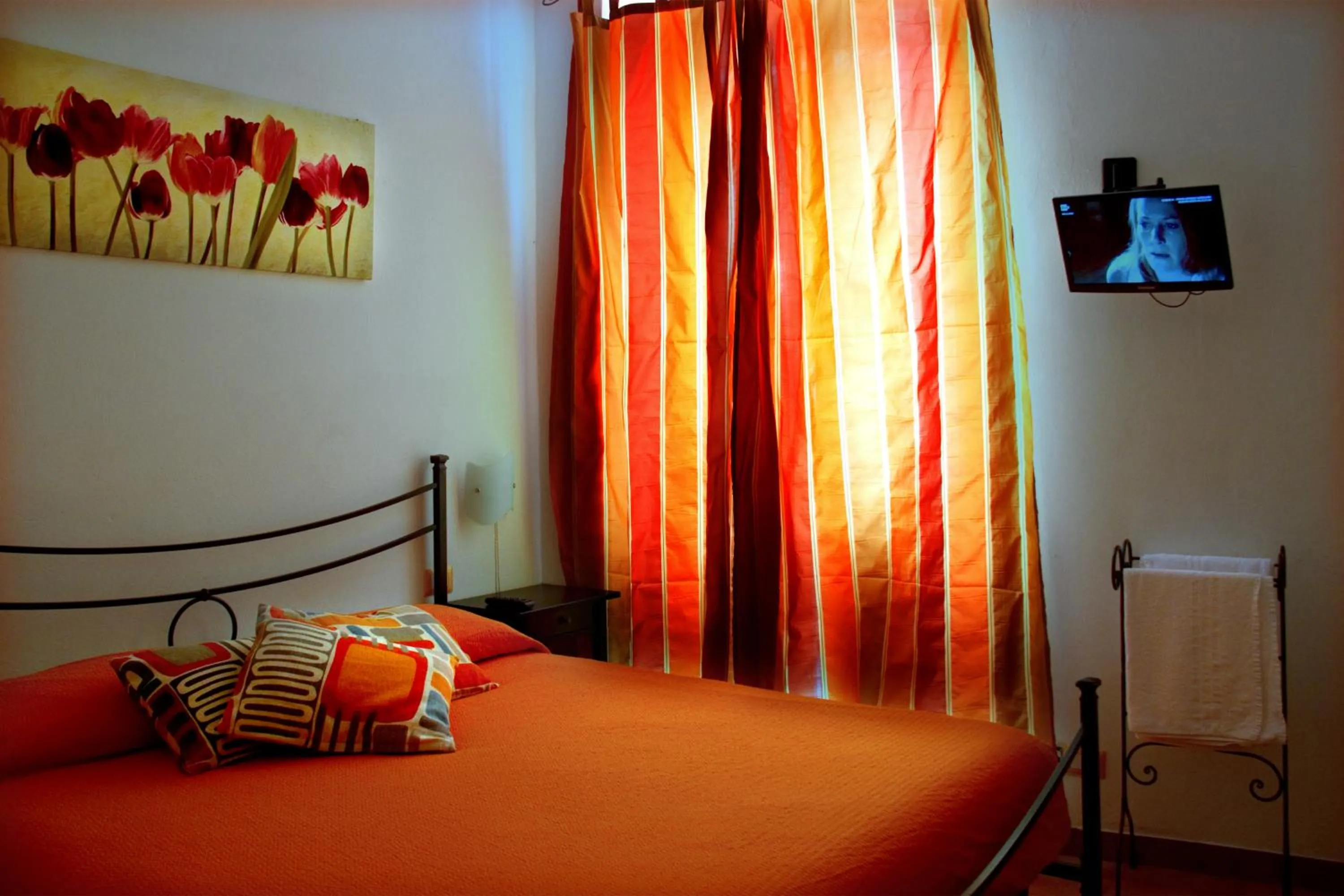 Bed in Affittacamere Rollando