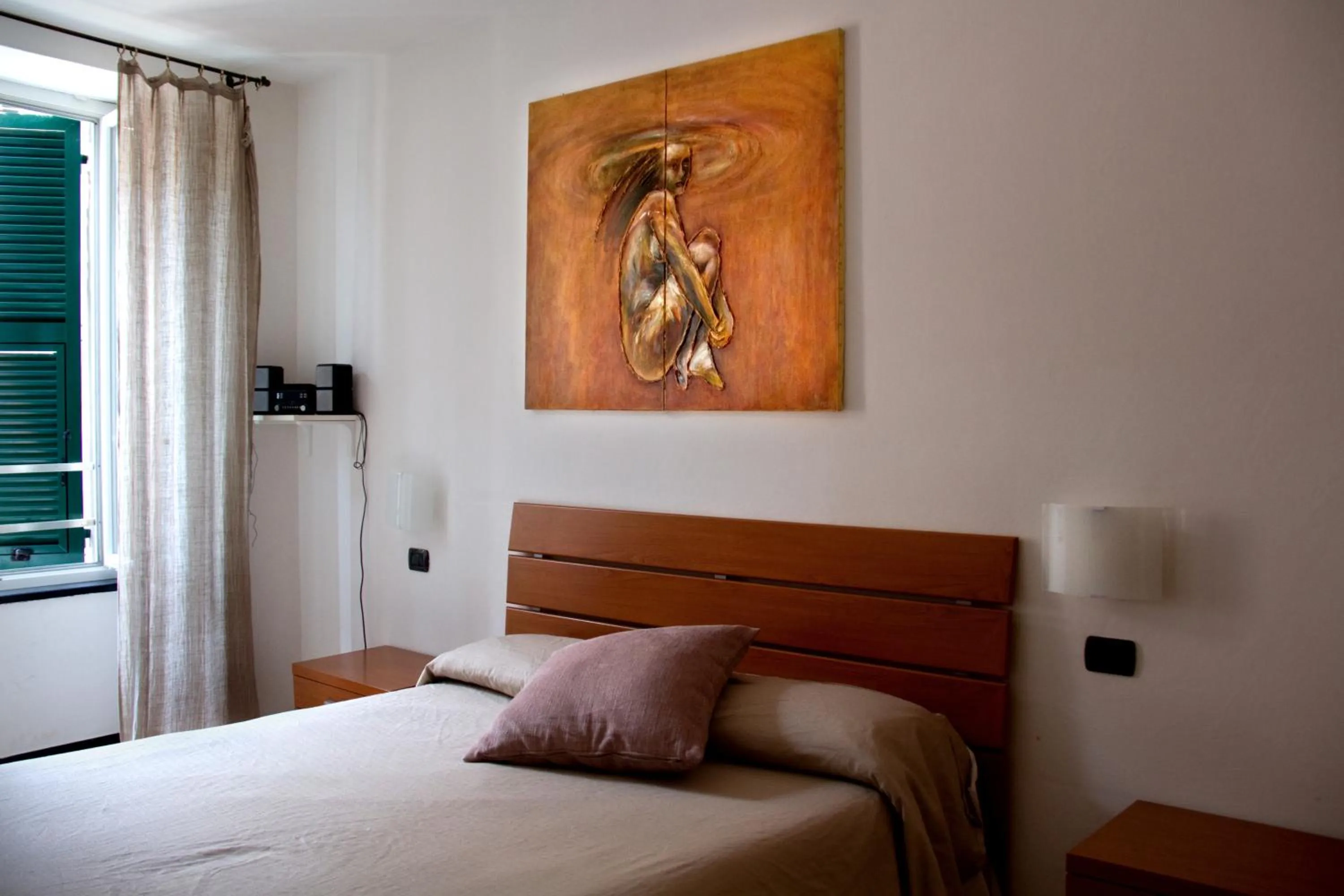 Bed in Affittacamere Rollando