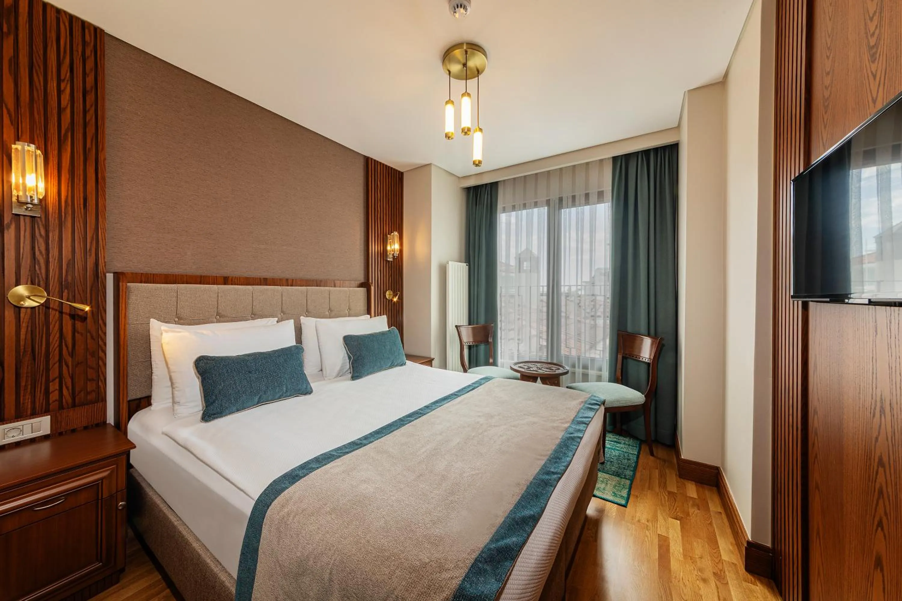 Photo of the whole room, Bed in Triton Hotel