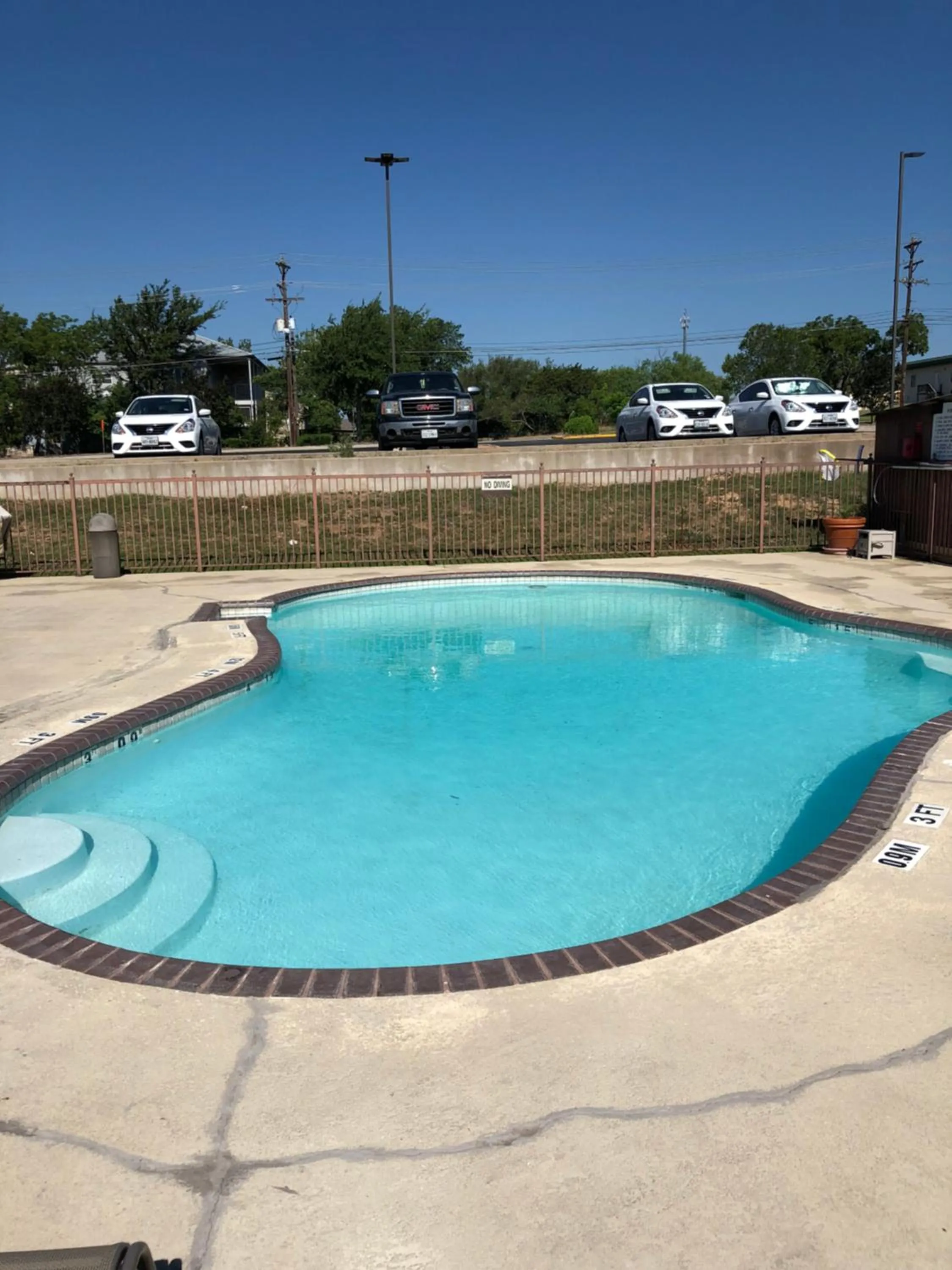 Swimming pool in Windcrest Inn and Suites