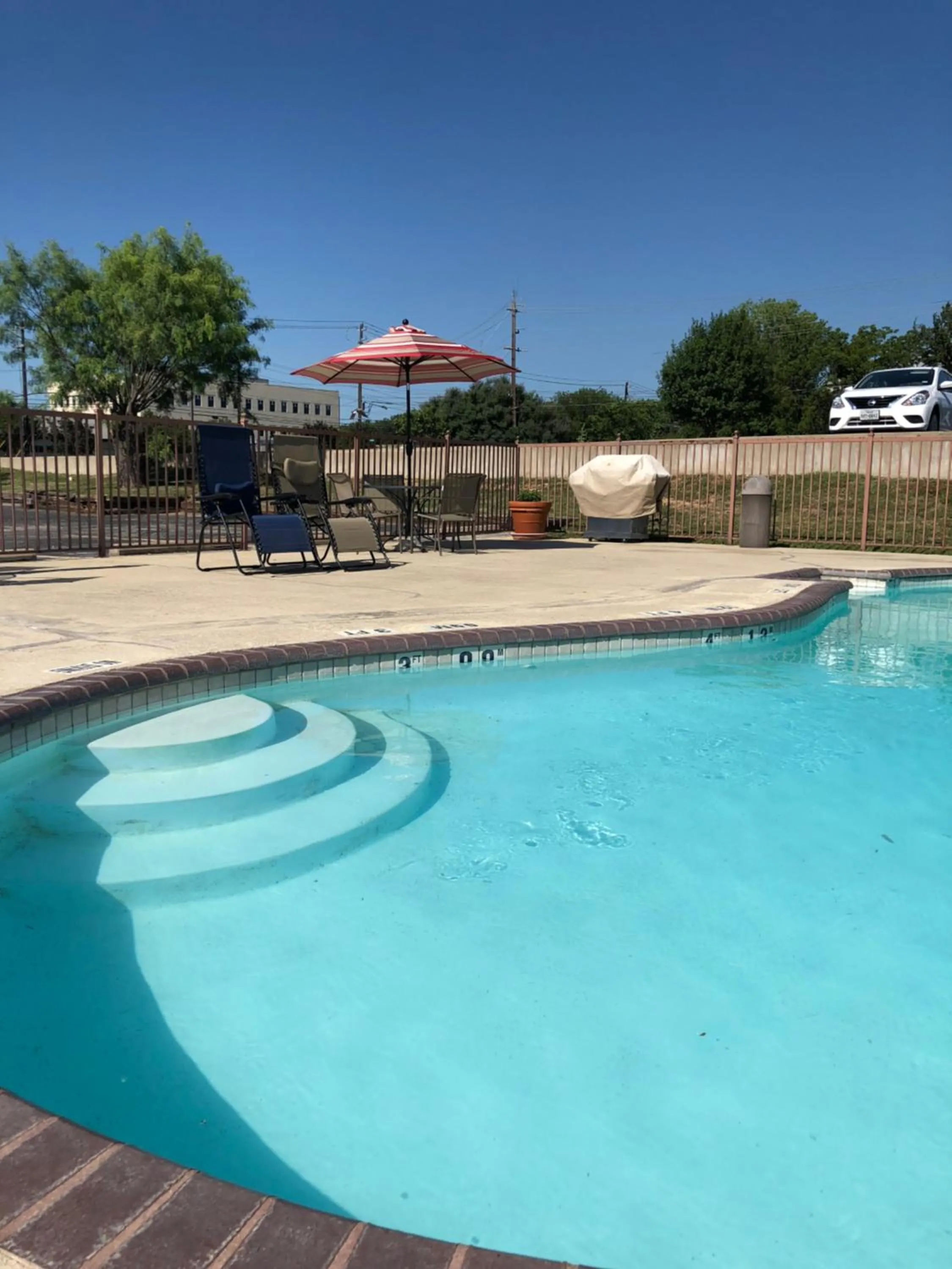 Swimming pool in Windcrest Inn and Suites