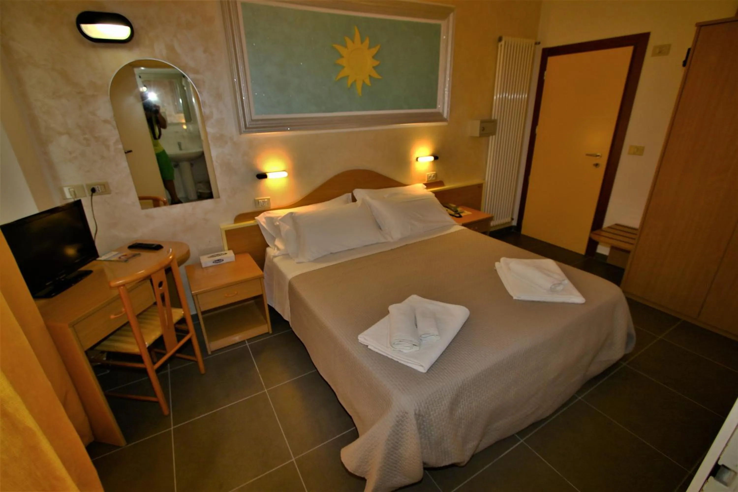 Bed in Hotel De Amicis