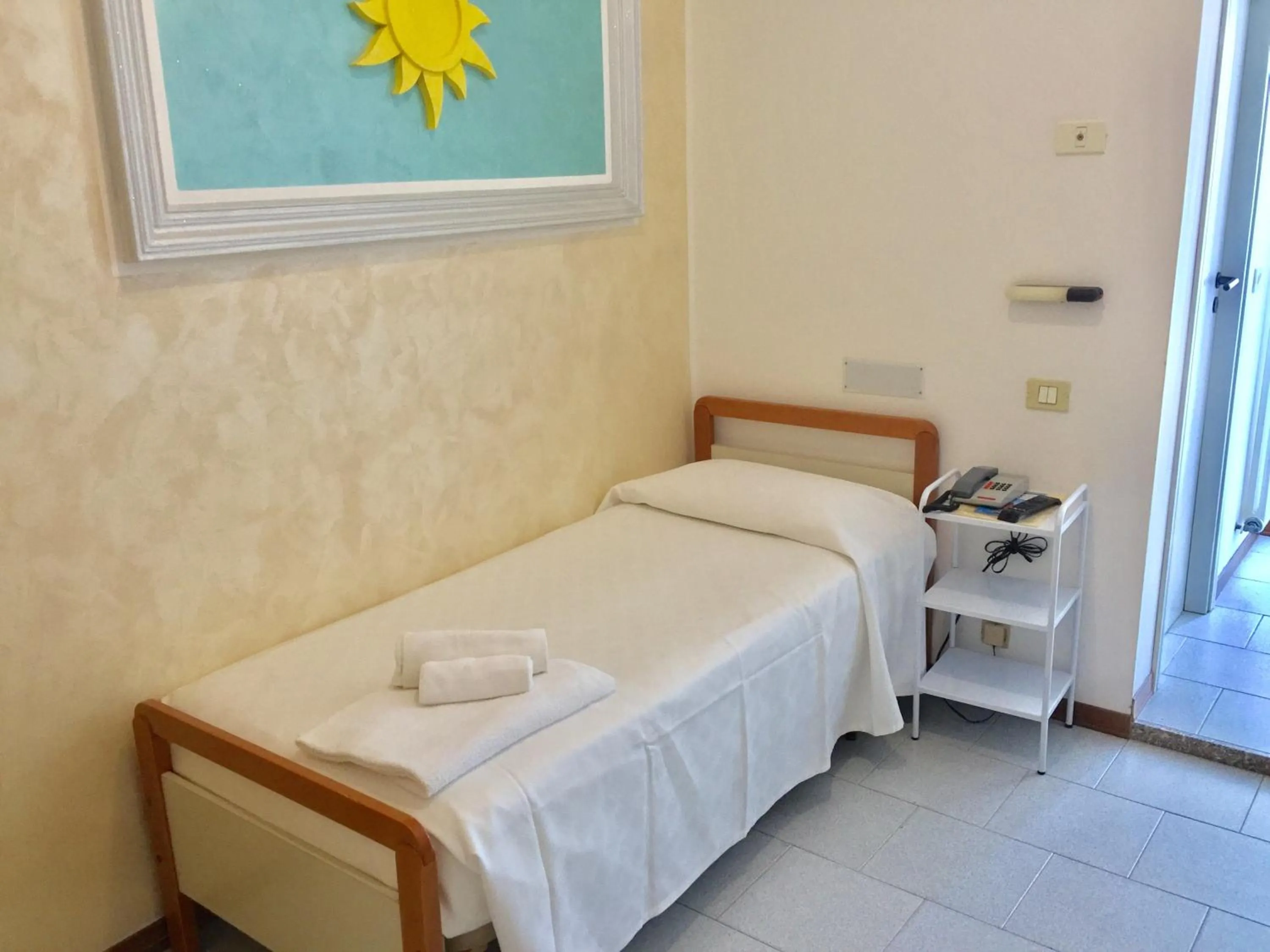 Bed in Hotel De Amicis