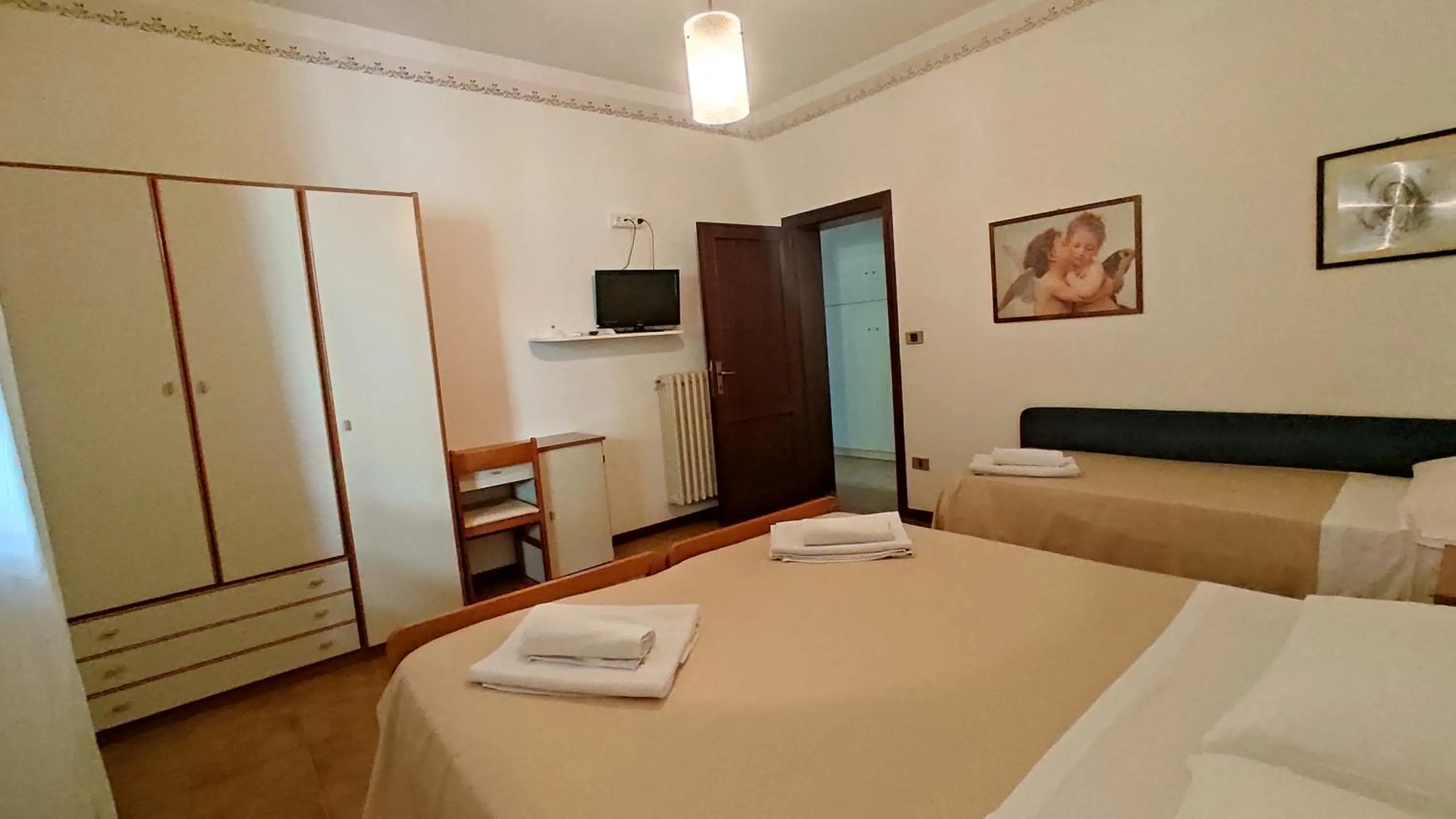 Bed in Hotel De Amicis