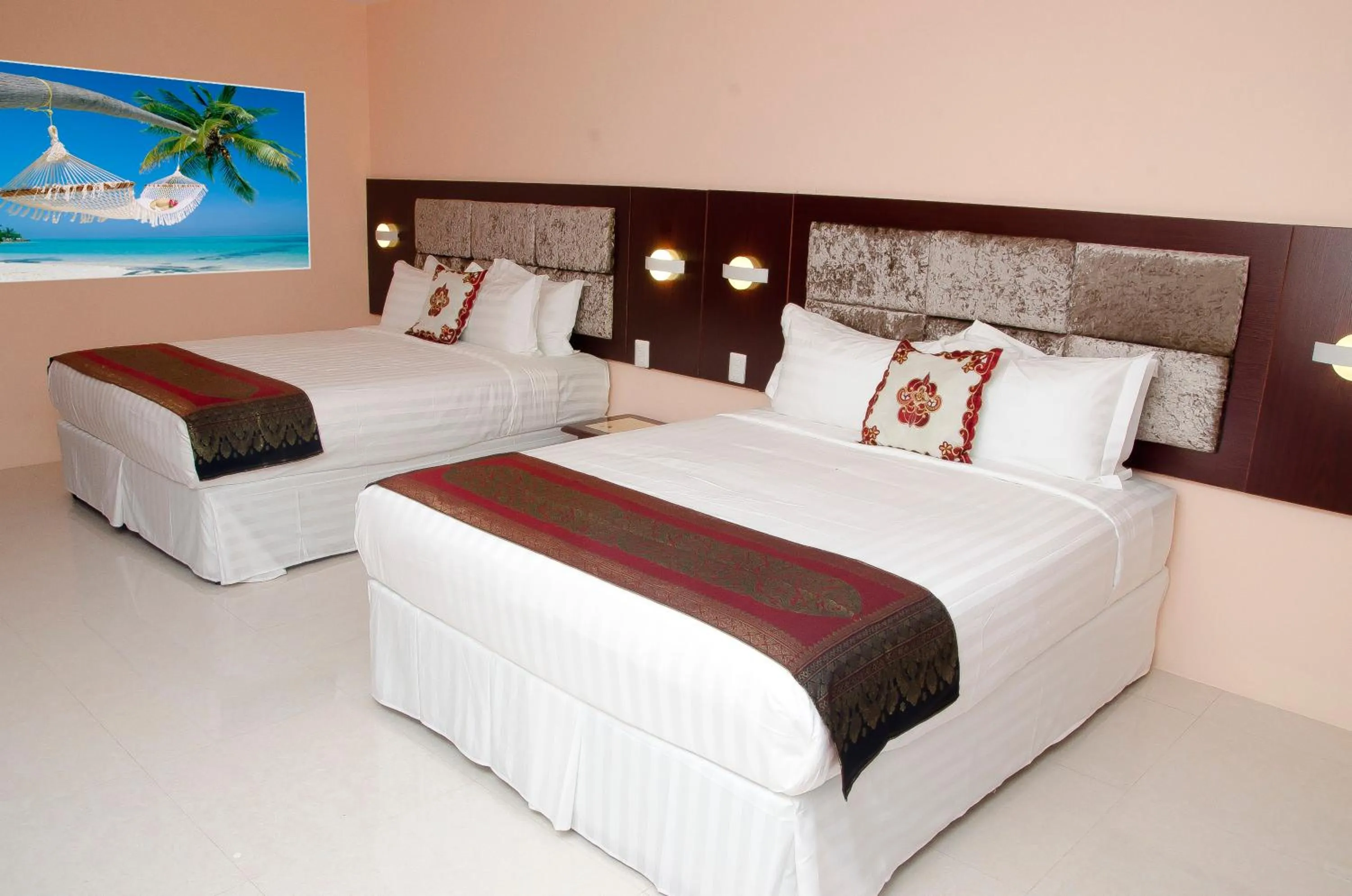 Bed in Grand Diamond Hotel Trinidad
