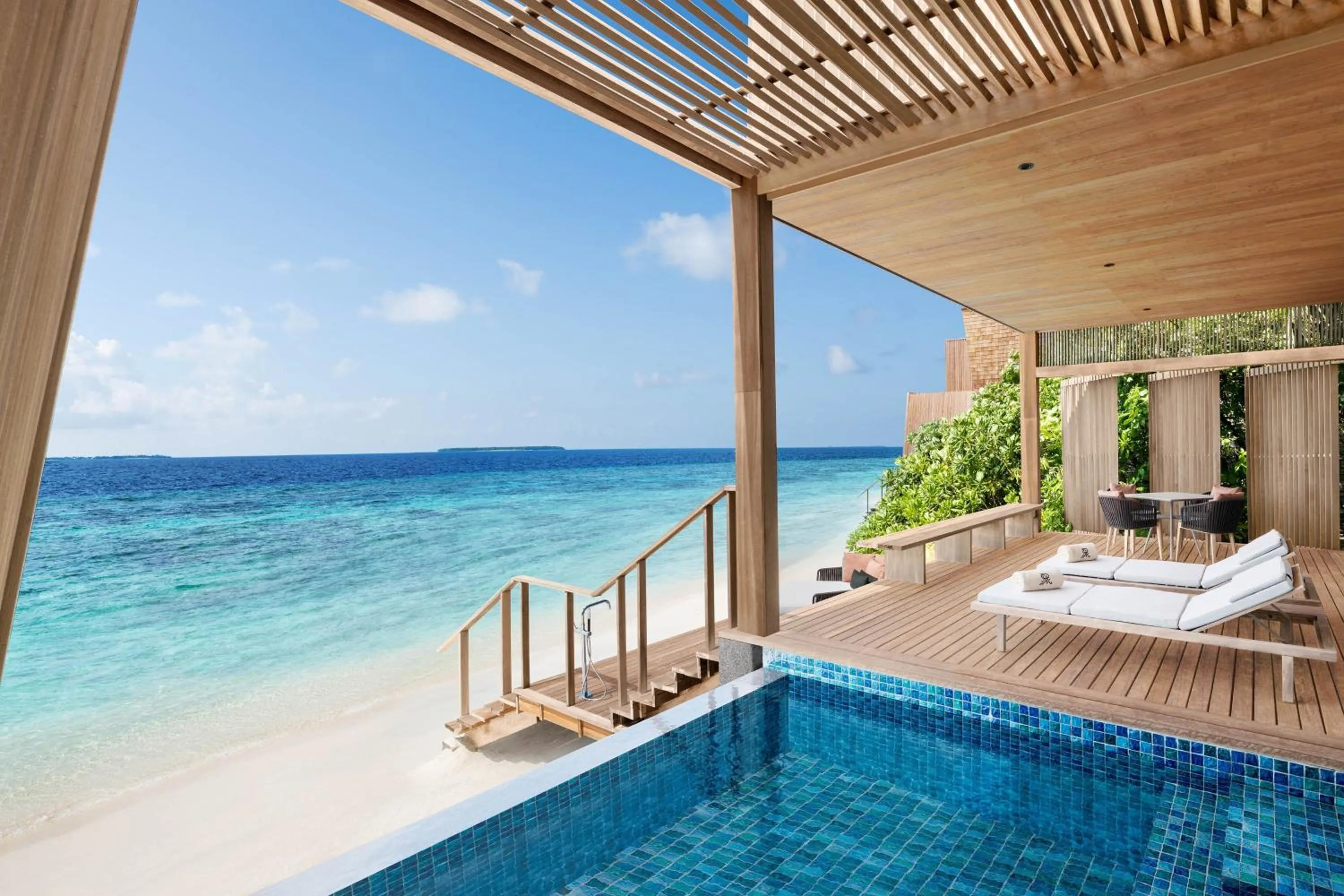 Swimming pool in The St. Regis Maldives Vommuli Resort