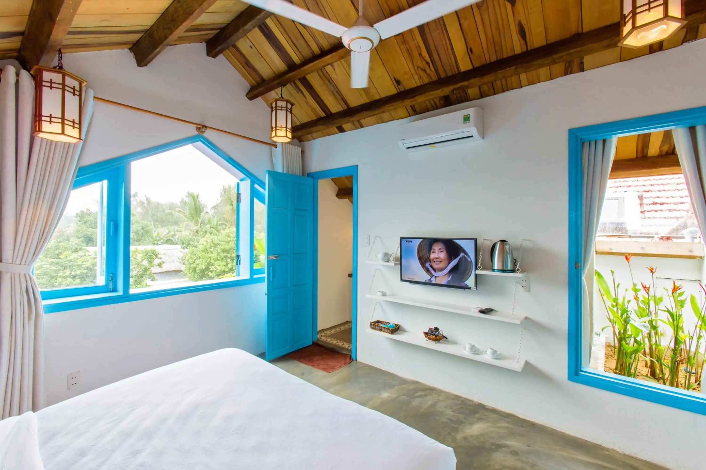 Bed in Life Beach Villa