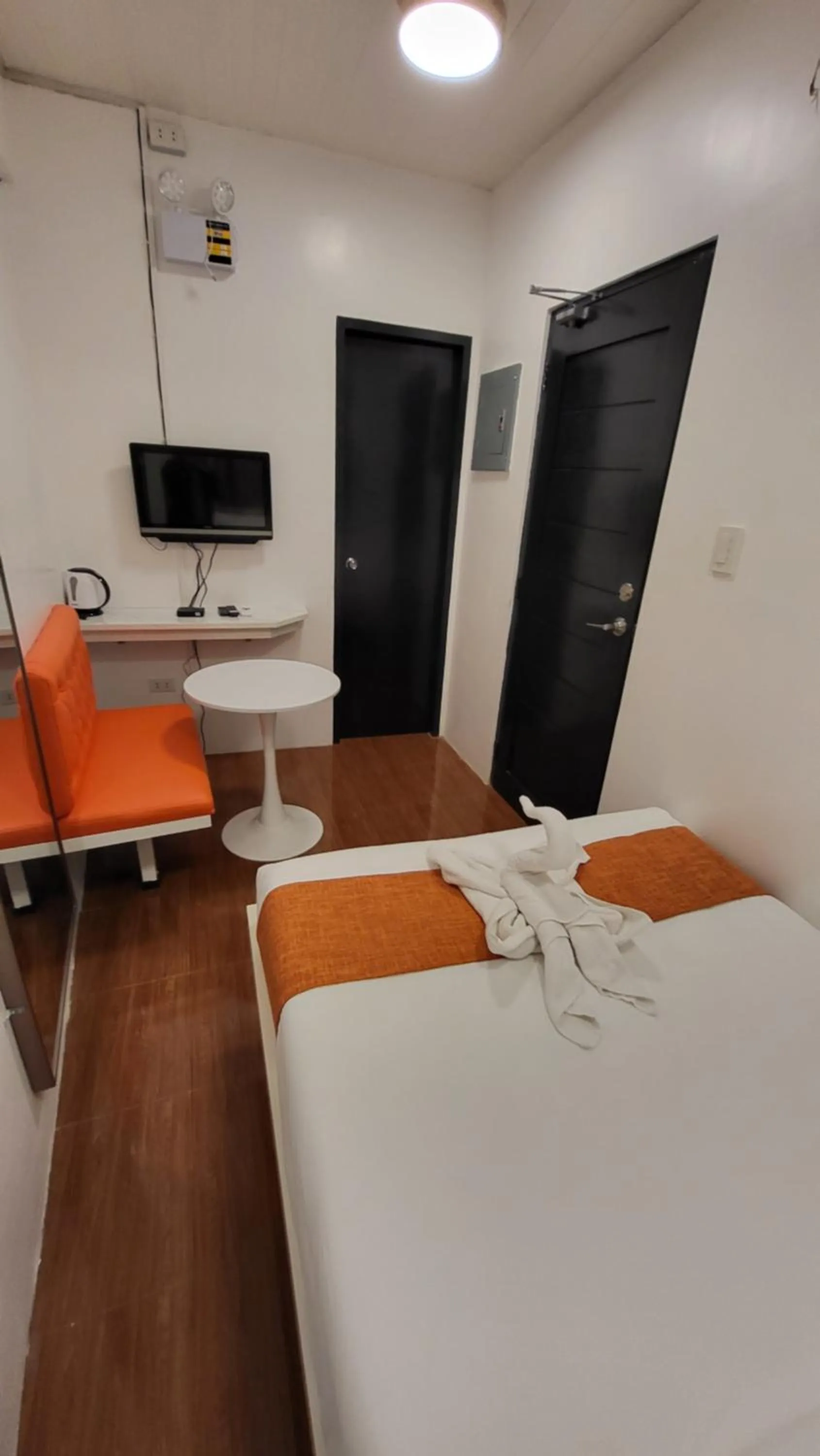 Seating area, Bed in Rangya Hotel