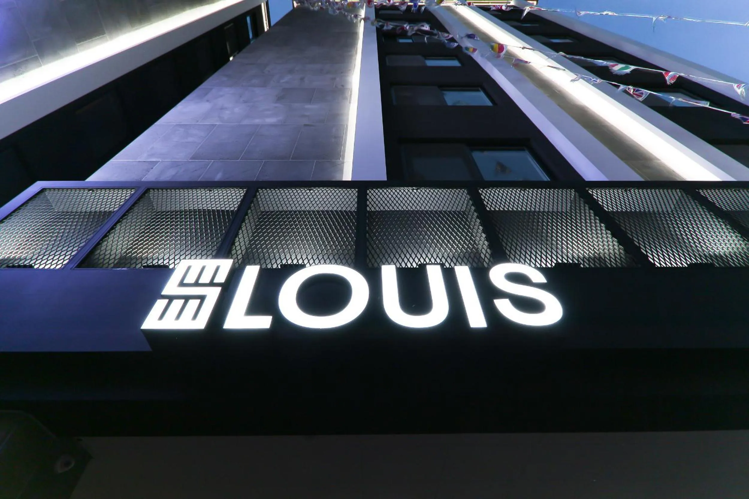 Property logo or sign in Louis Hotel