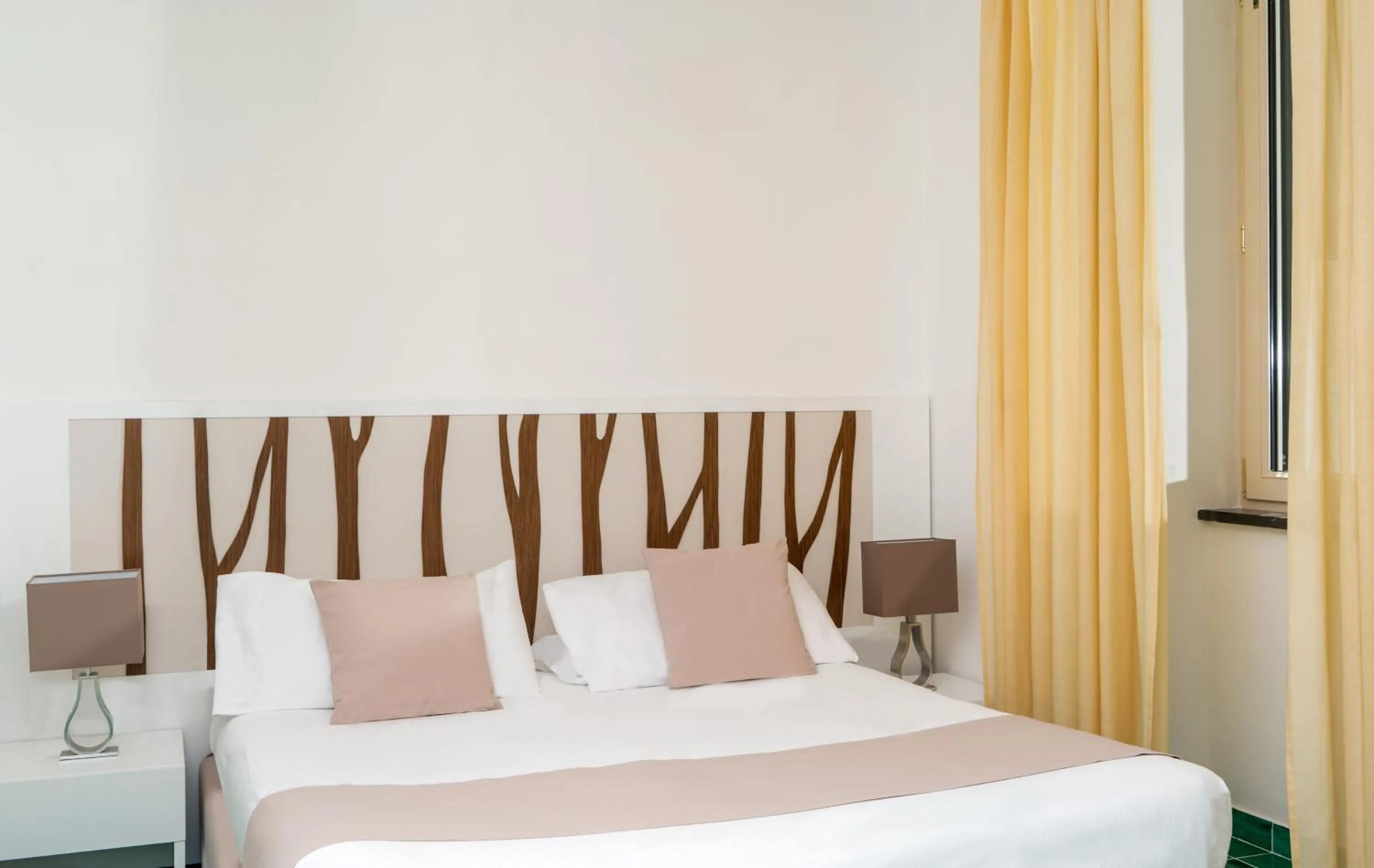 Bed in Le Ancore Hotel