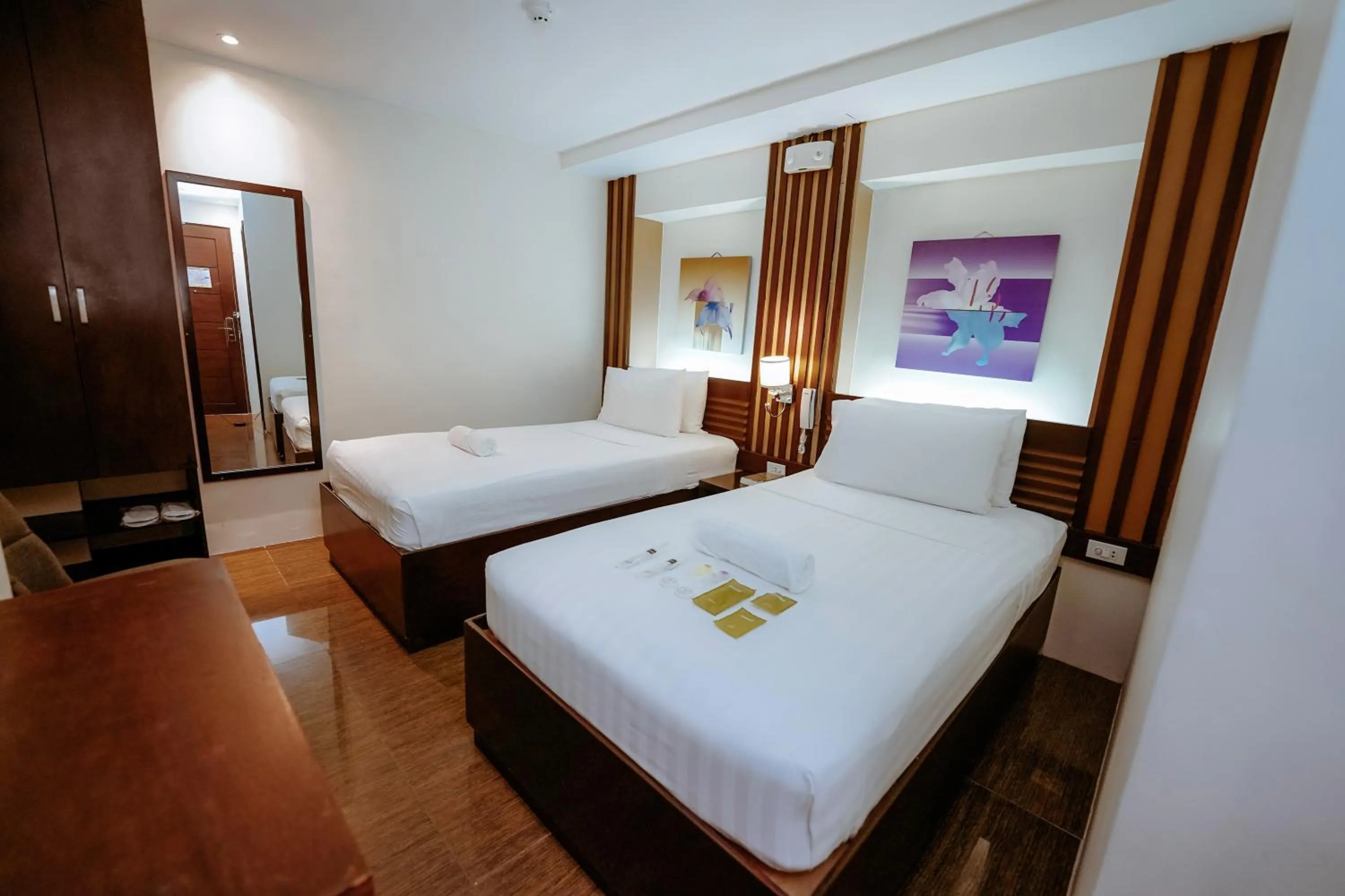 Bed in Emerald Boutique Hotel