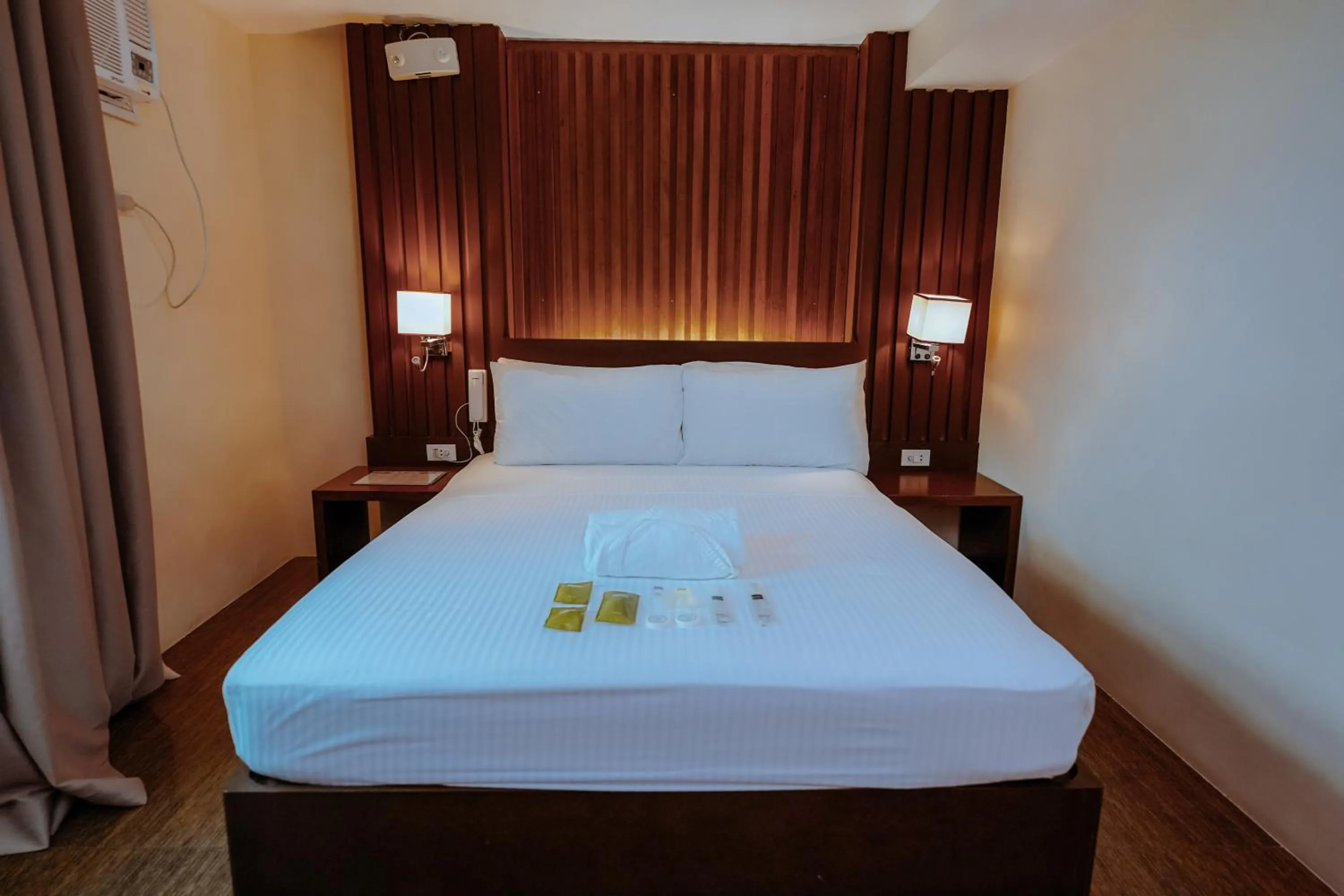 Bed in Emerald Boutique Hotel