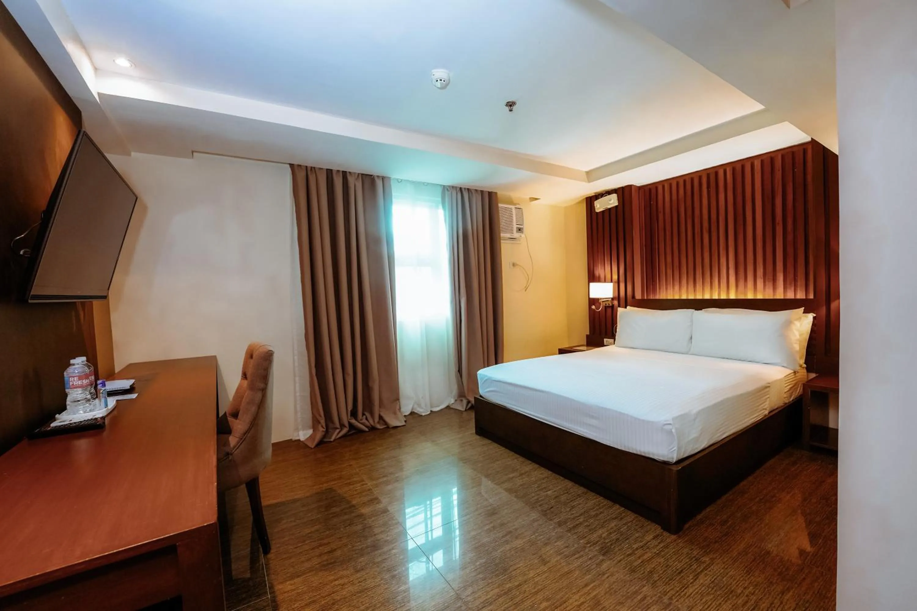 Bed in Emerald Boutique Hotel