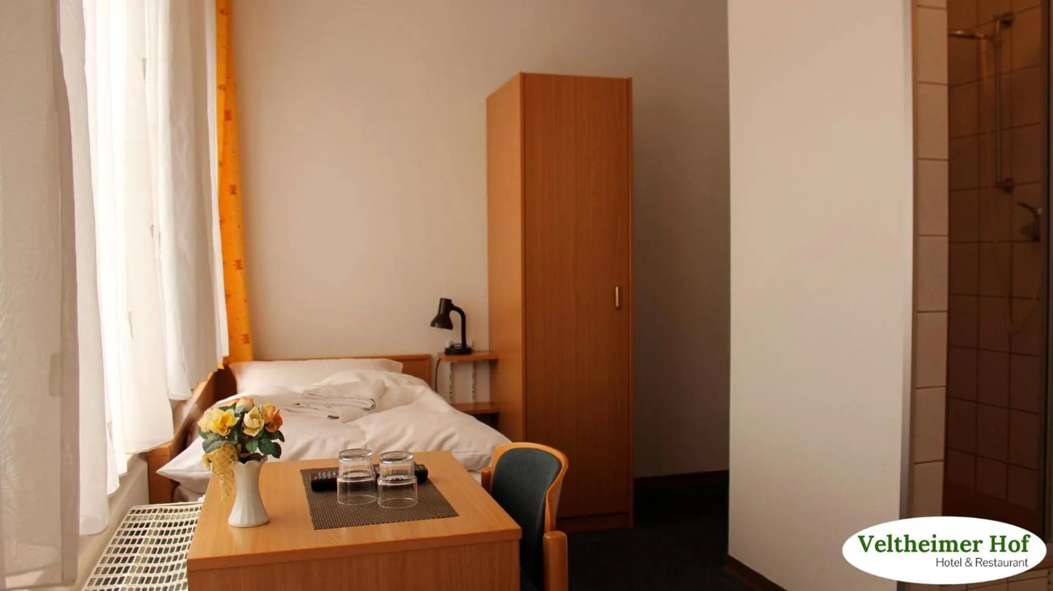 Photo of the whole room, Bed in Landgasthaus Veltheimer Hof