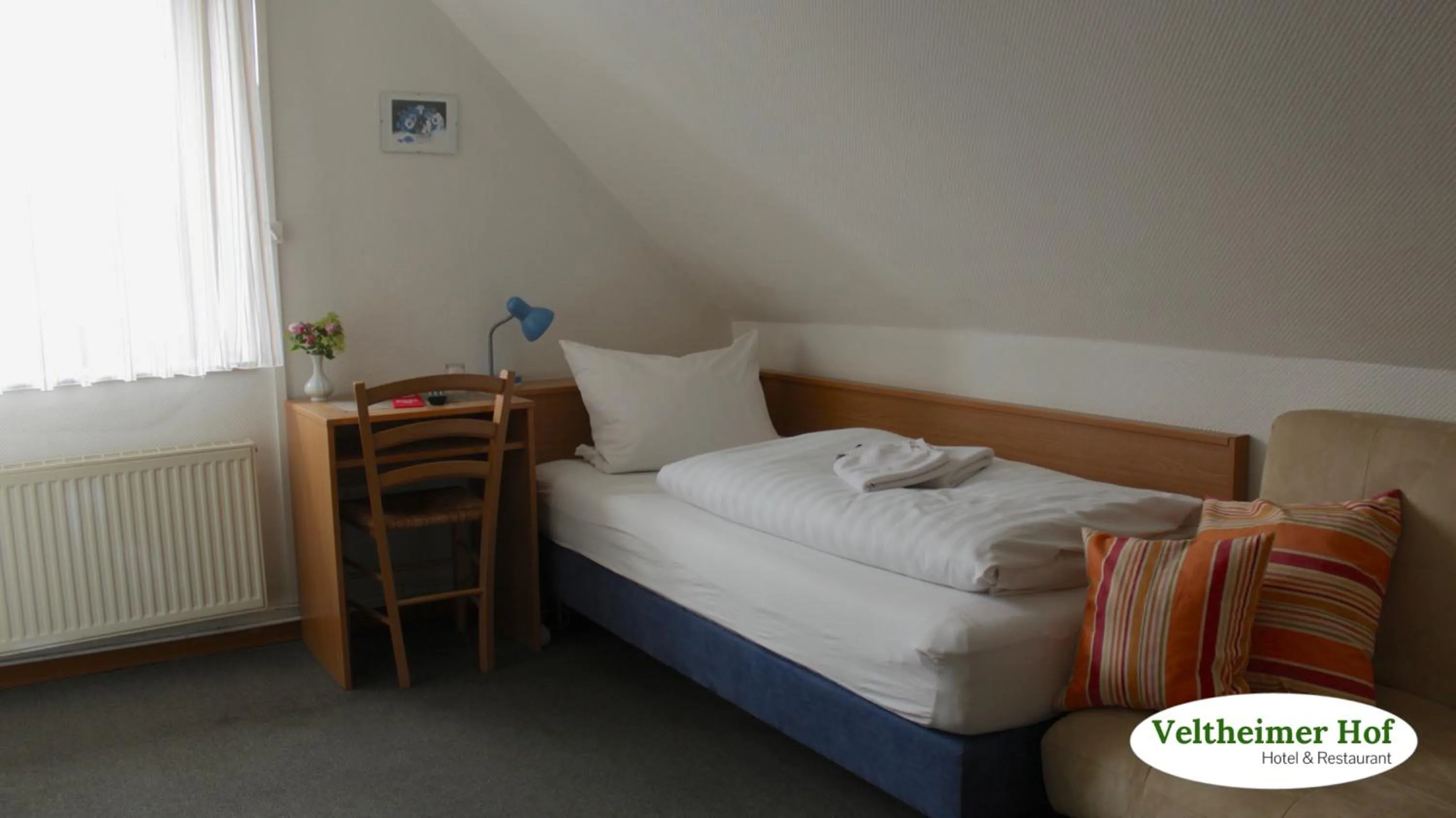 Photo of the whole room, Bed in Landgasthaus Veltheimer Hof
