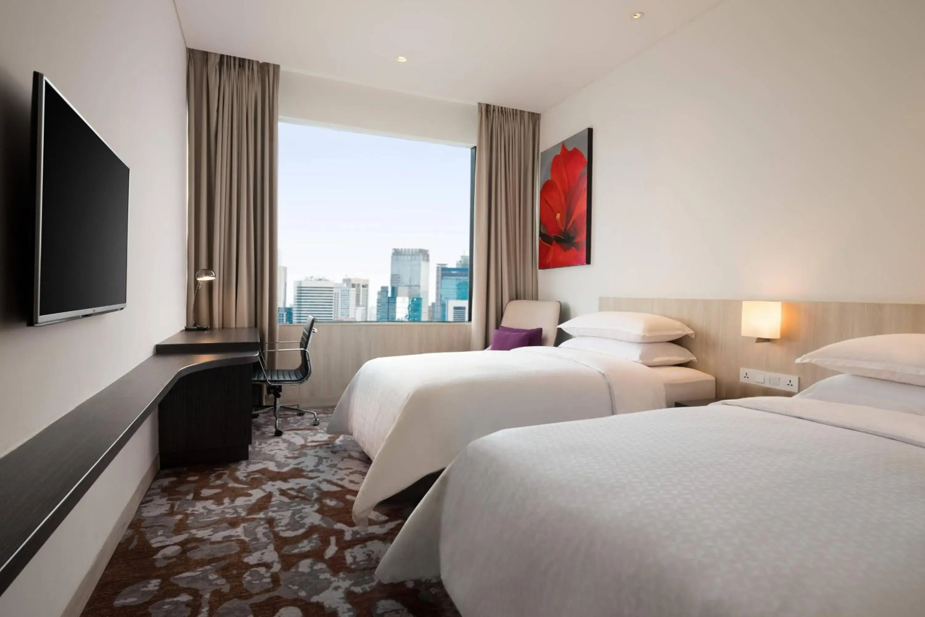 Twin Room with City View in Four Points by Sheraton Jakarta Thamrin Twin Room with City View in Four Points by Sheraton Jakarta Thamrin