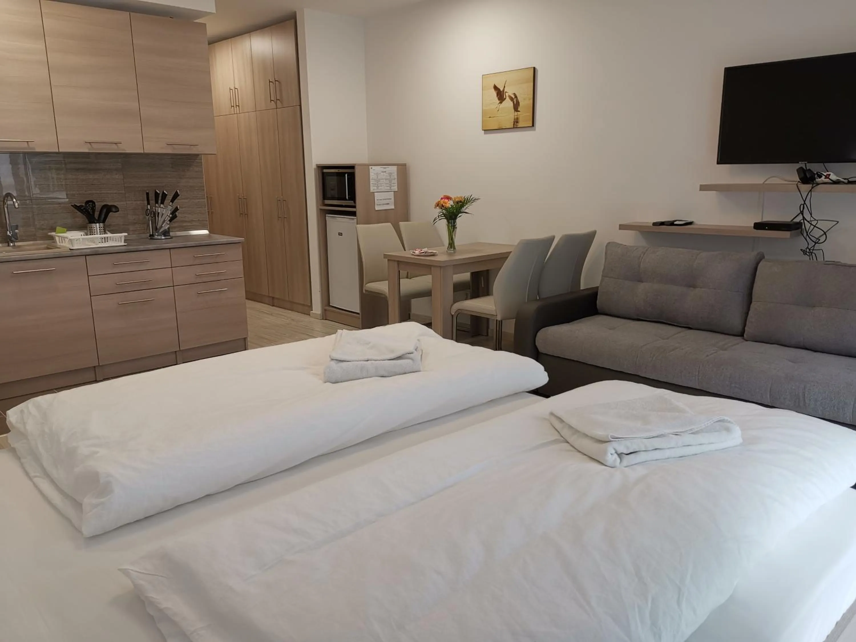 Bed in Corvin holiday Apartments hotel