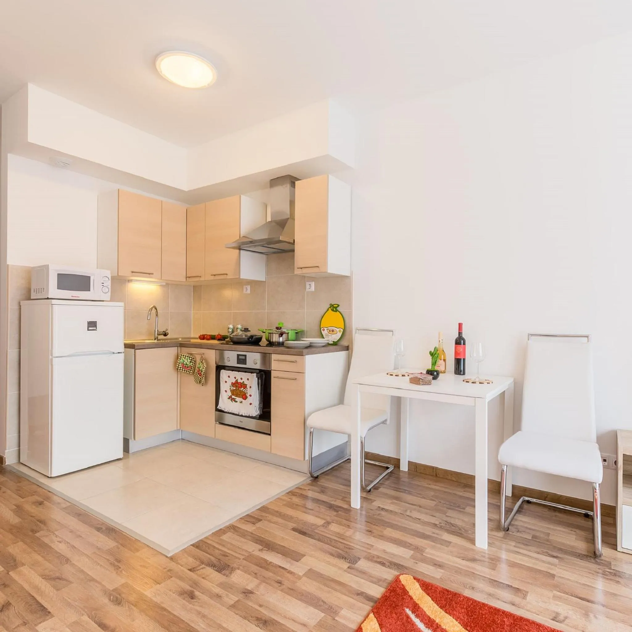 Kitchen or kitchenette in Corvin holiday Apartments hotel