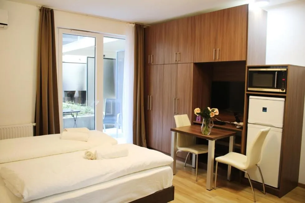 Bed in Corvin holiday Apartments hotel