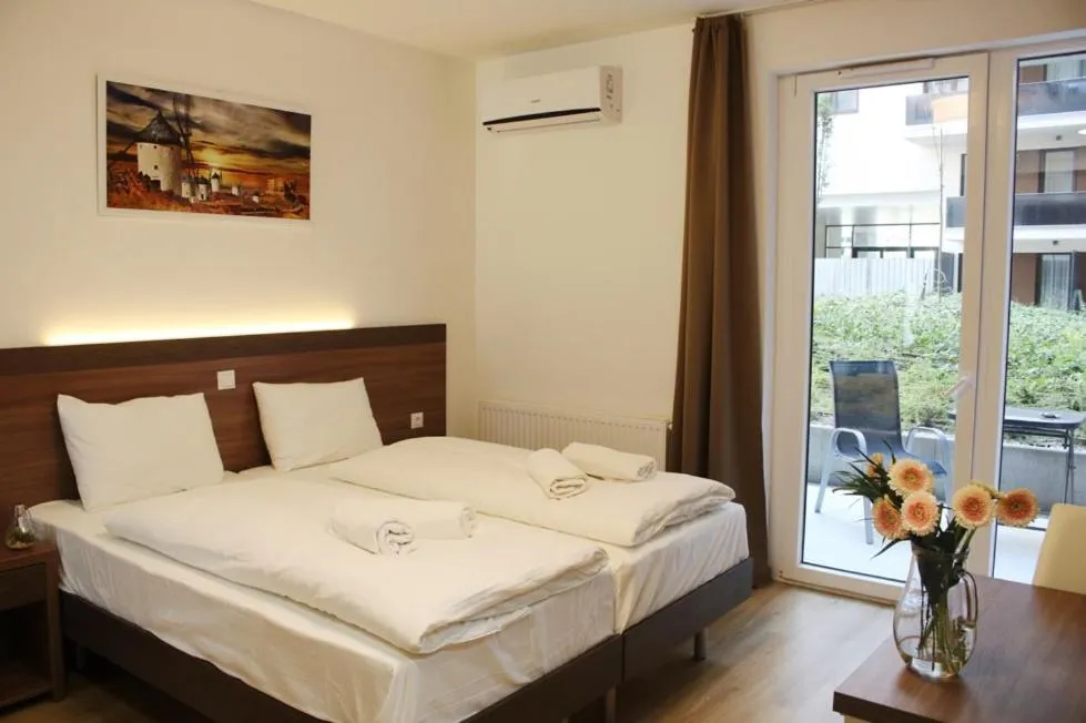 Bed in Corvin holiday Apartments hotel