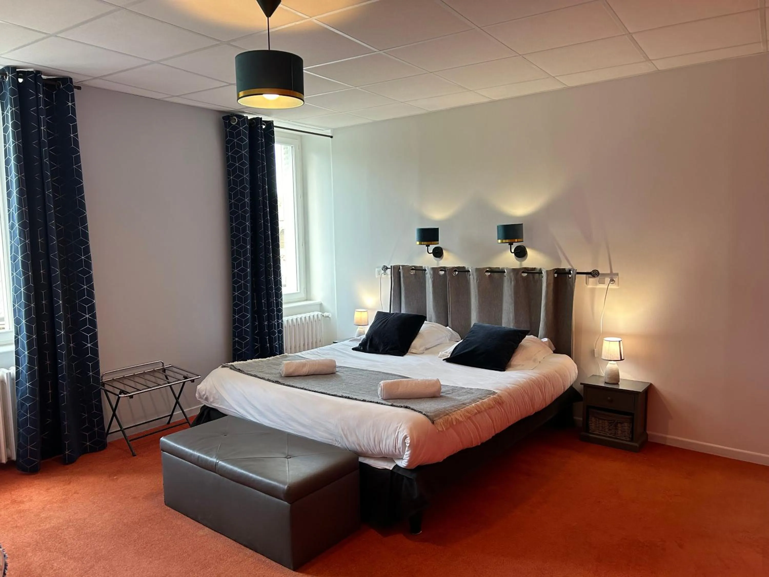 Bed in Logis Hôtel de Paris