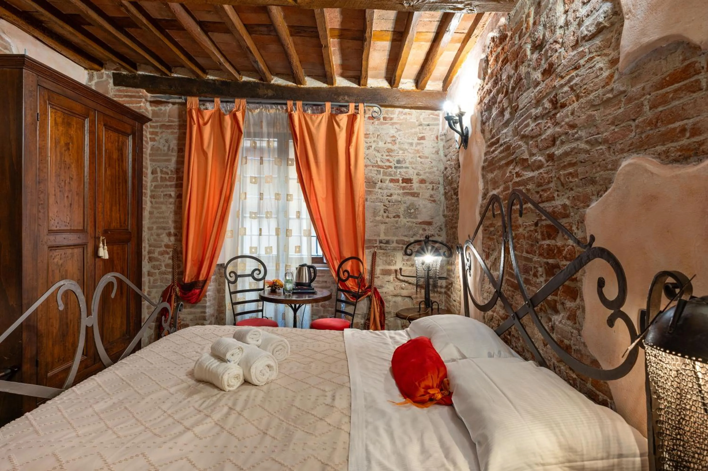 Bed in Antica Corte dei Principi Charming Rooms