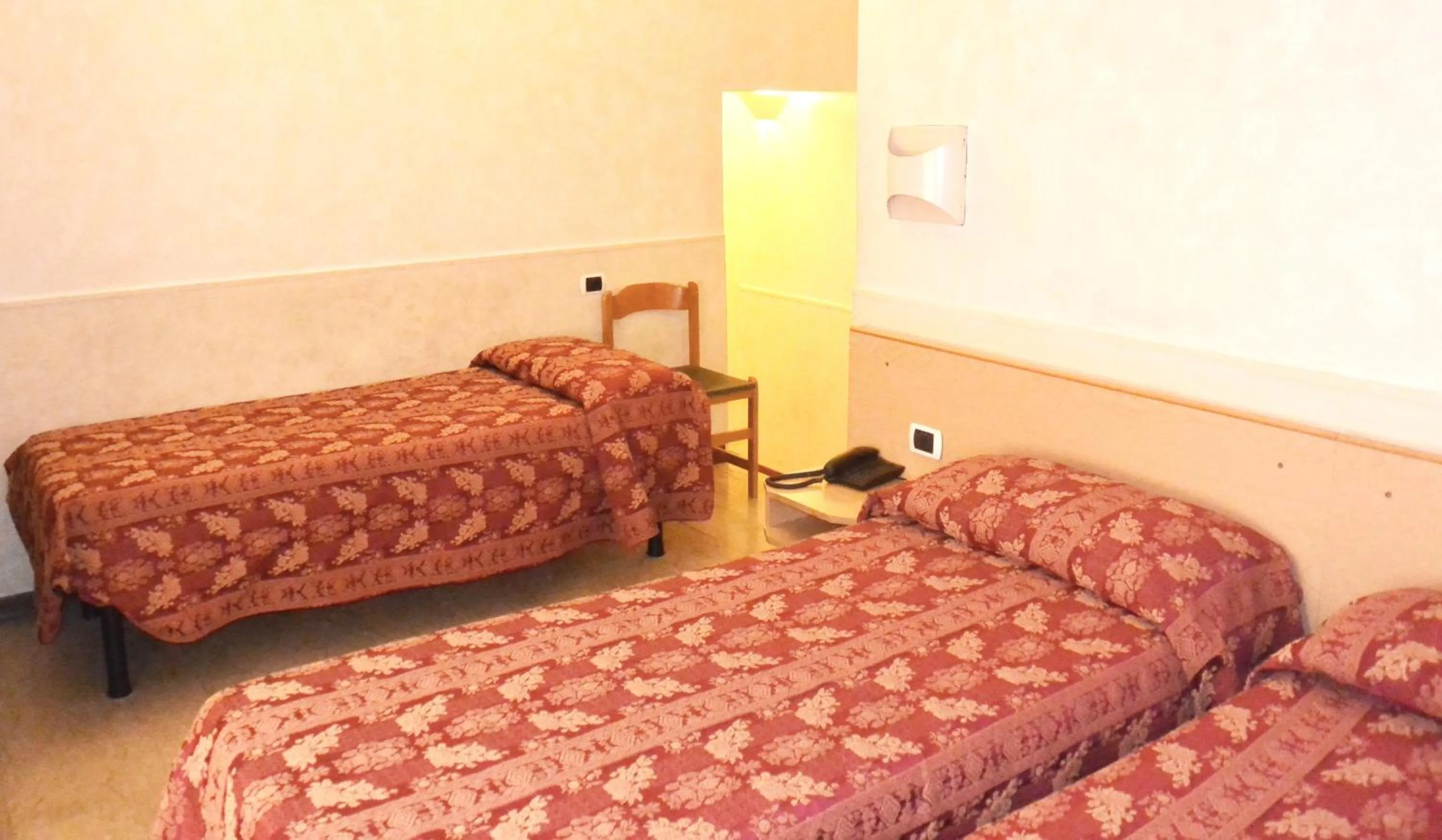 Bed in Hotel Nettuno