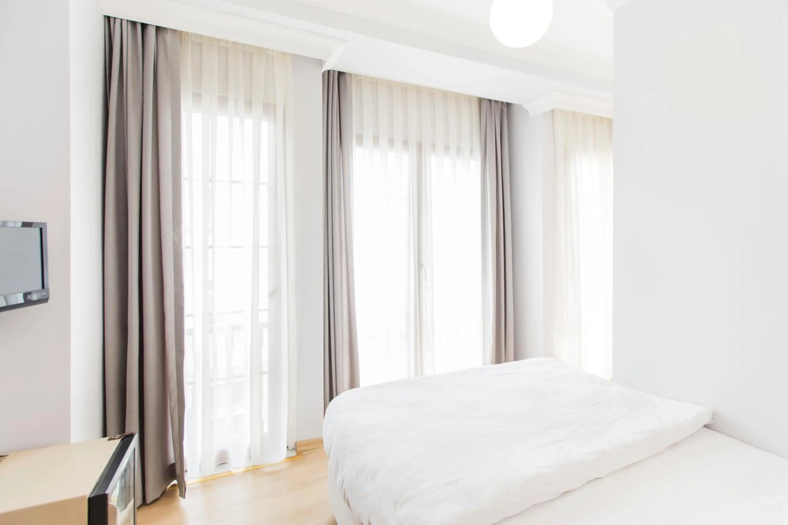 Photo of the whole room, Bed in Bucoleon by Cheers