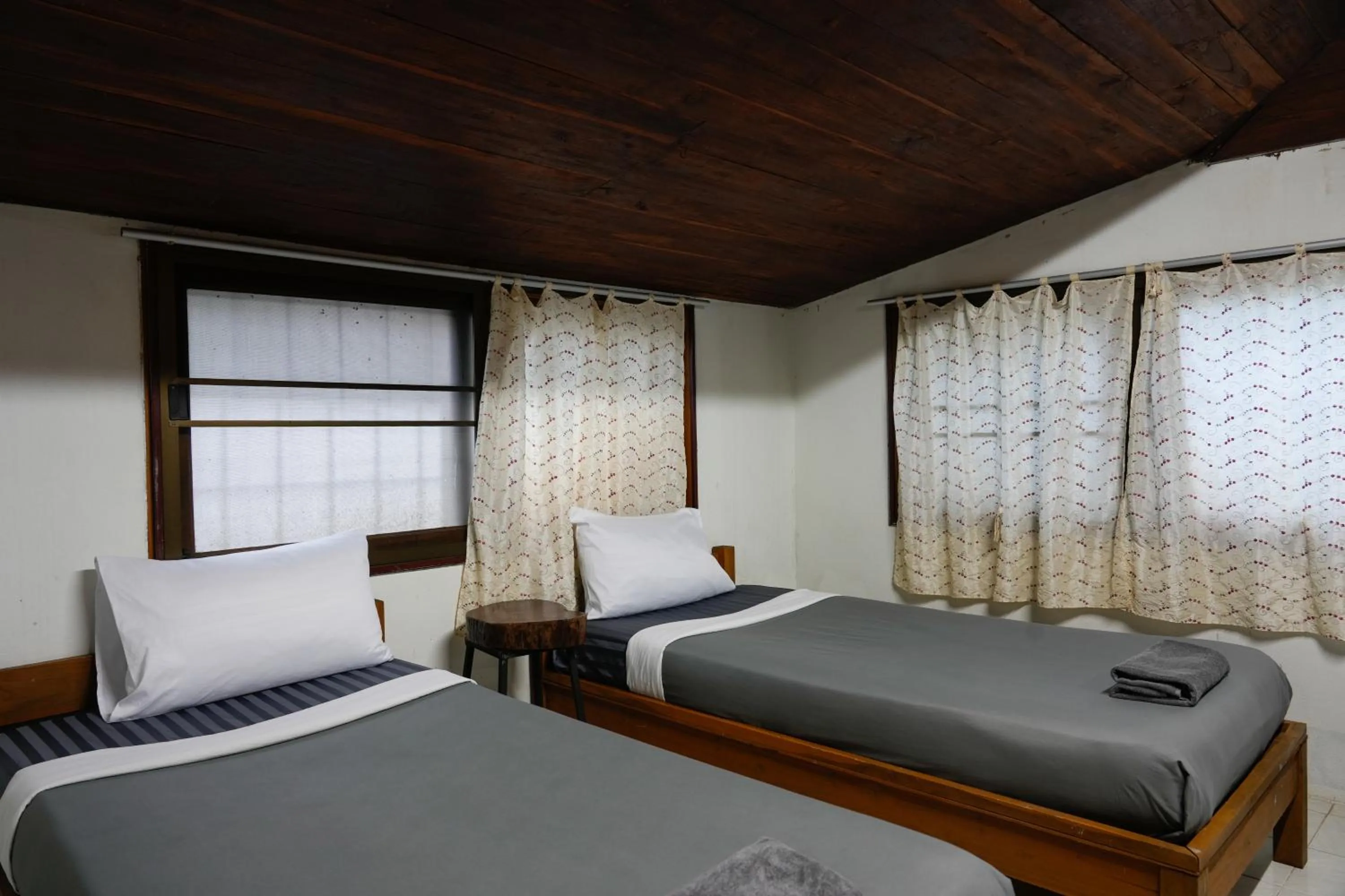 Bed in Maewin Resort