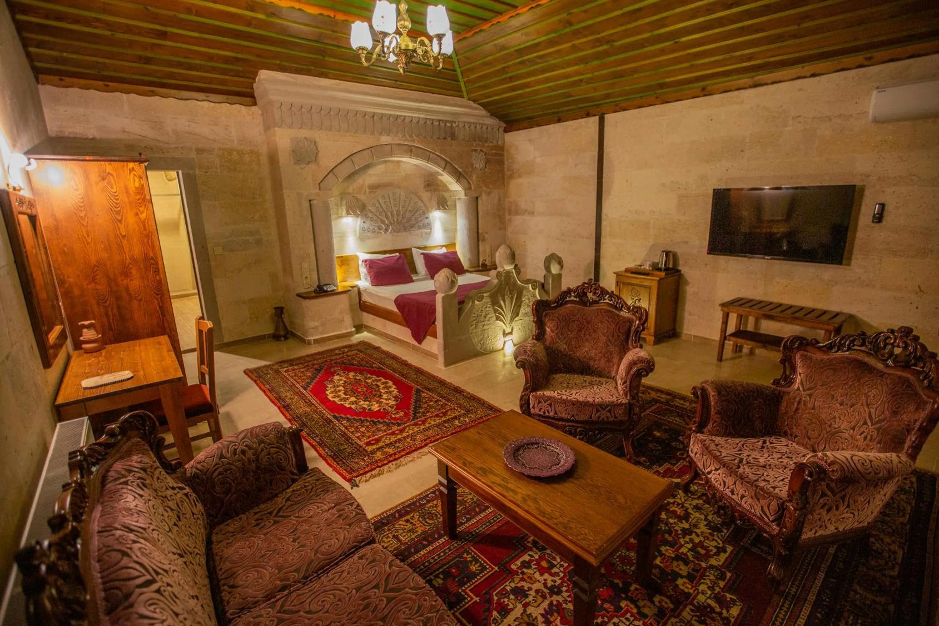 Living room in Stone House Cave Hotel