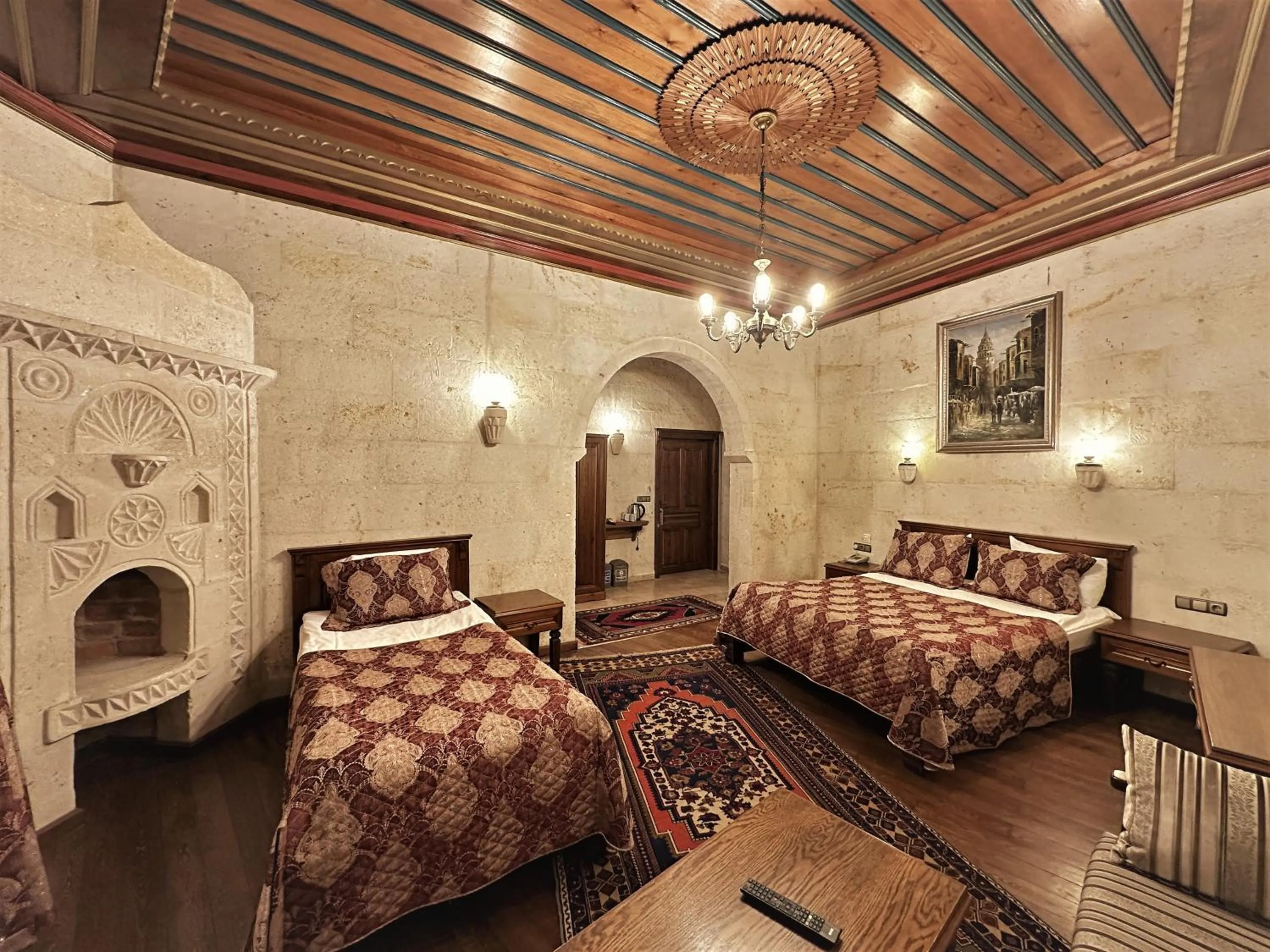 Bed in Stone House Cave Hotel