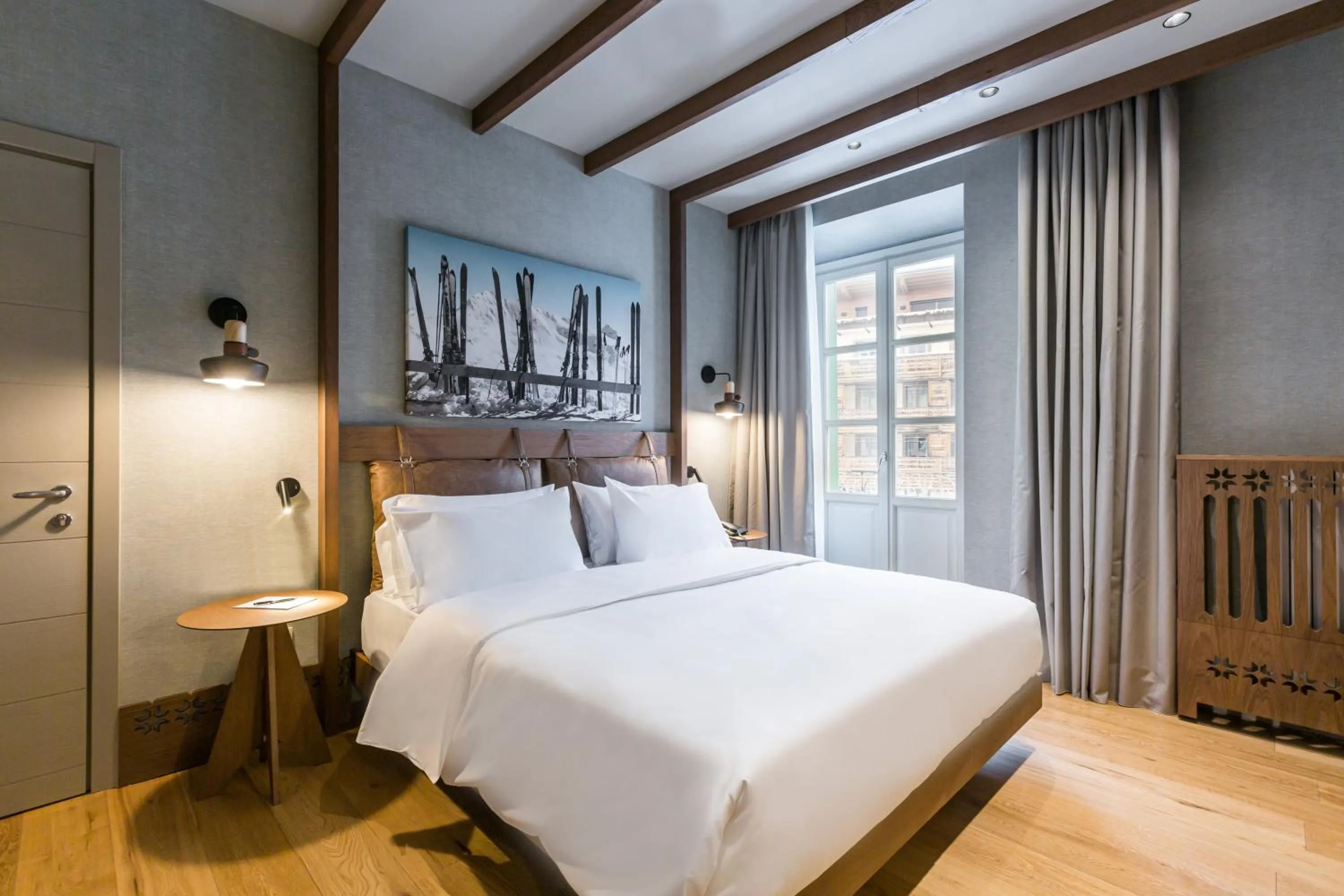 Bedroom, Bed in Grand Hotel Savoia Cortina d'Ampezzo, A Radisson Collection Hotel