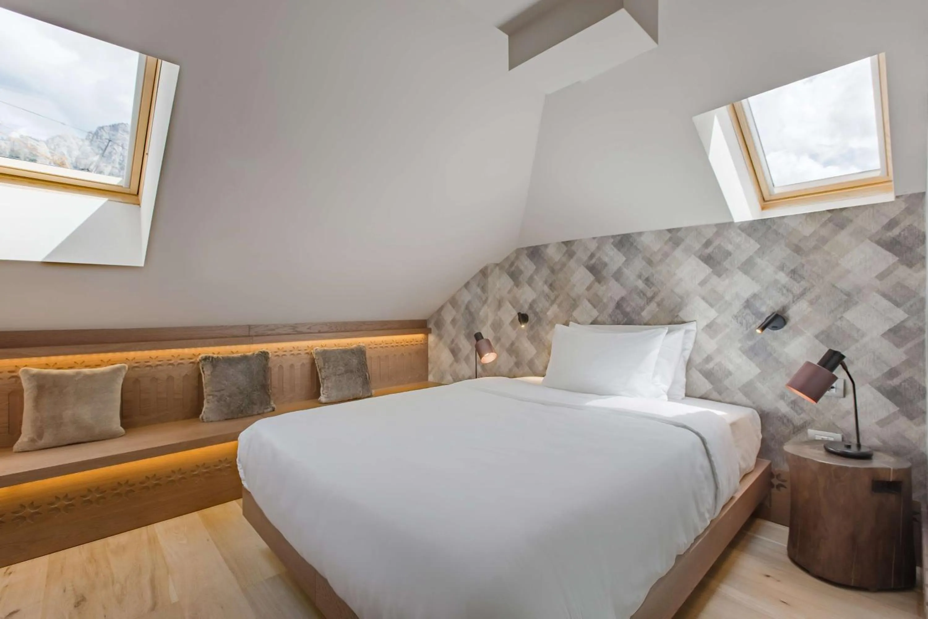 Photo of the whole room, Bed in Grand Hotel Savoia Cortina d'Ampezzo, A Radisson Collection Hotel