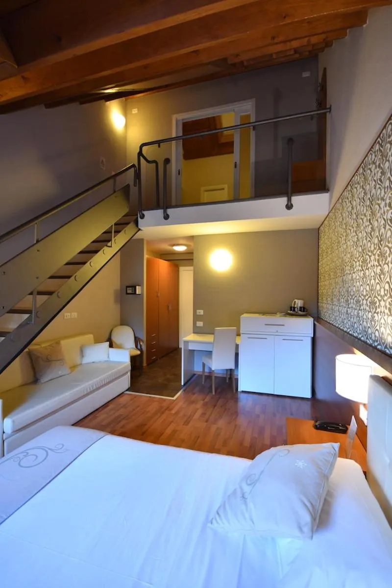 Bedroom, Bed in Hotel Il Cervo, SPA & Wellness, Bike Hotel