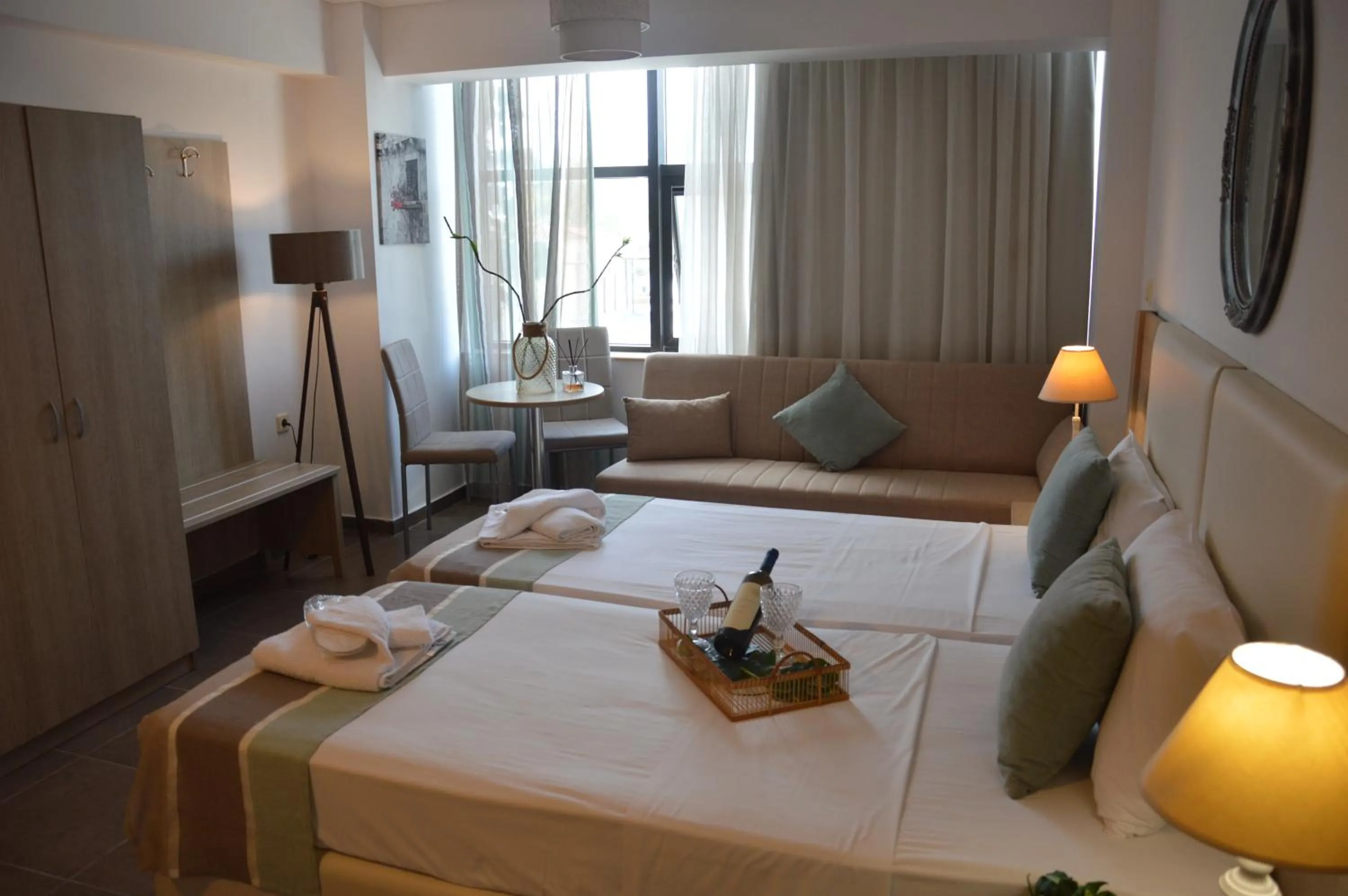 Photo of the whole room, Bed in Aqua Mare Sea Side Rooms