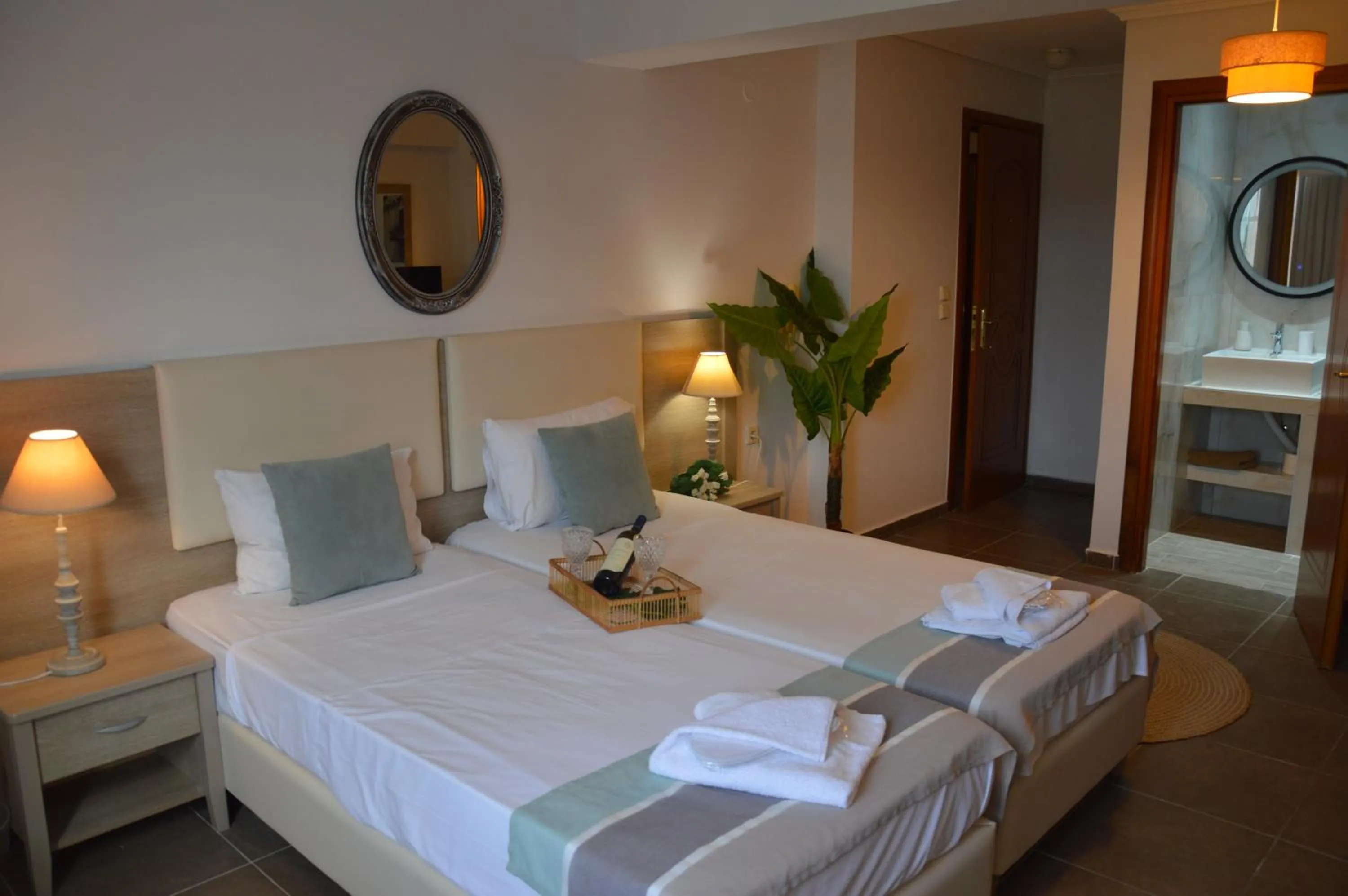 Bed in Aqua Mare Sea Side Rooms