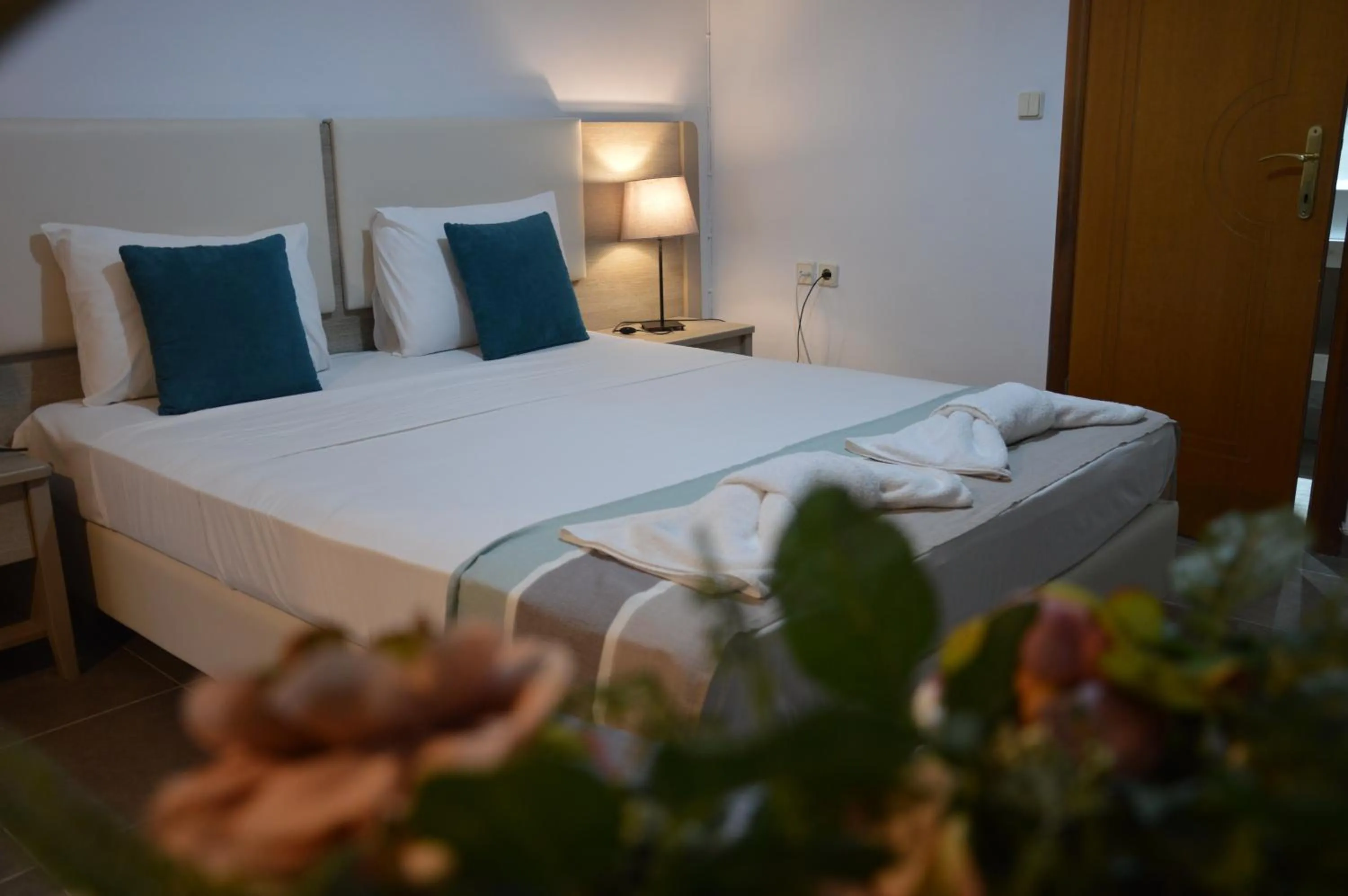 Bed in Aqua Mare Sea Side Rooms