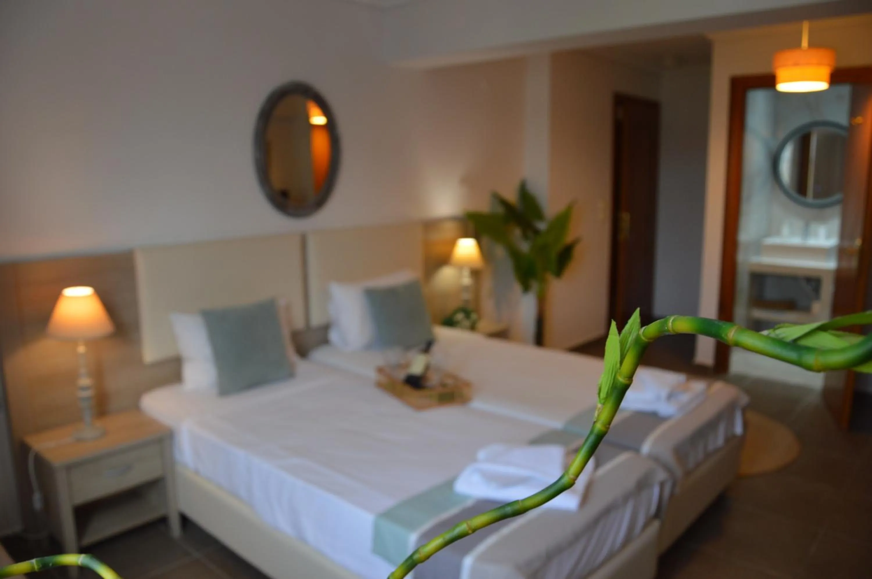 Bed in Aqua Mare Sea Side Rooms