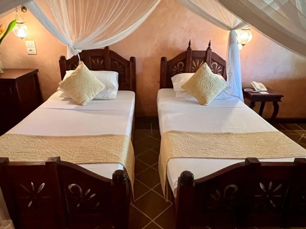 Bed in Hotel Club Dongwe