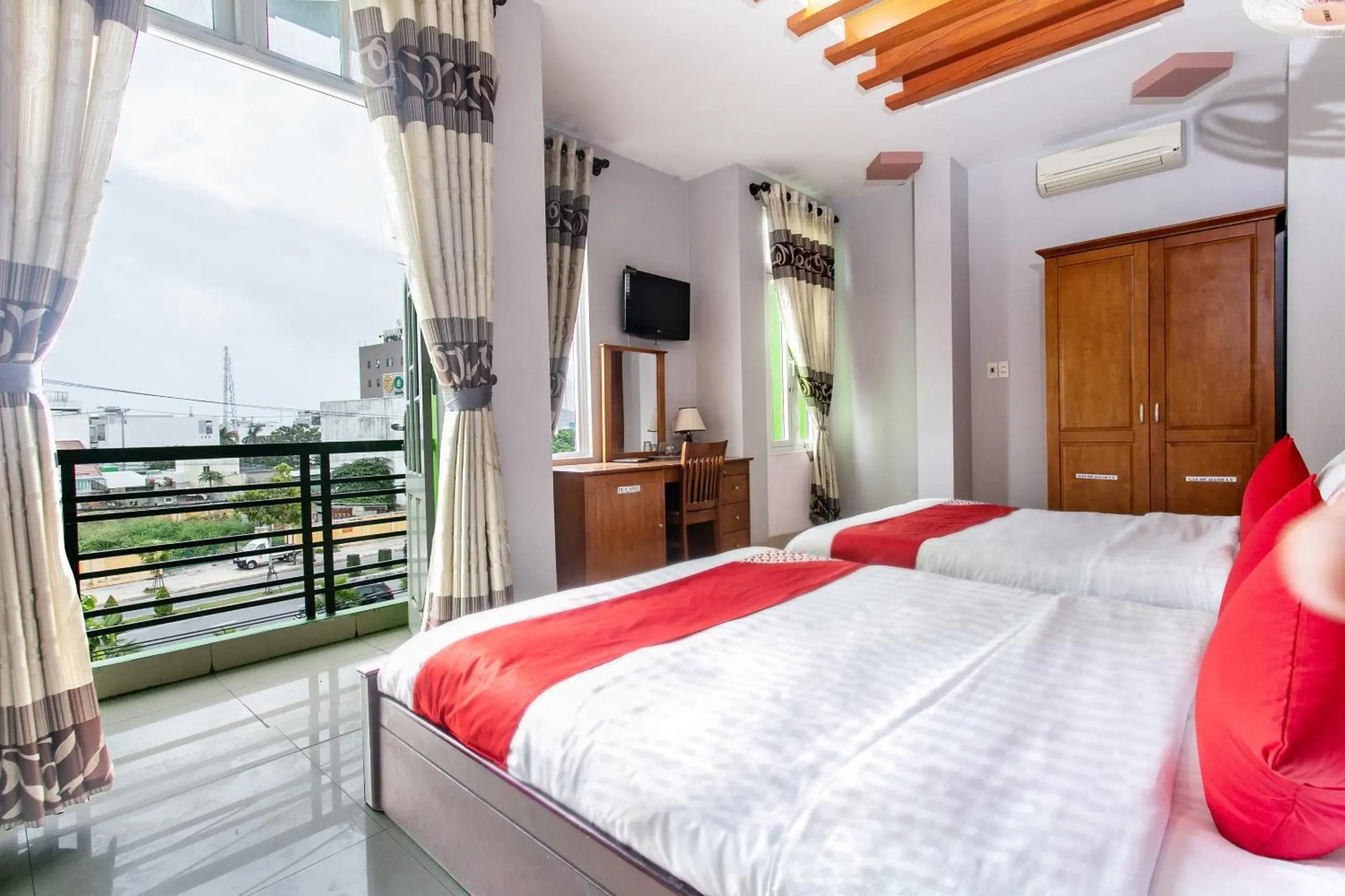 Quadruple Room in Honey Hotel Da Nang Quadruple Room in Honey Hotel Da Nang