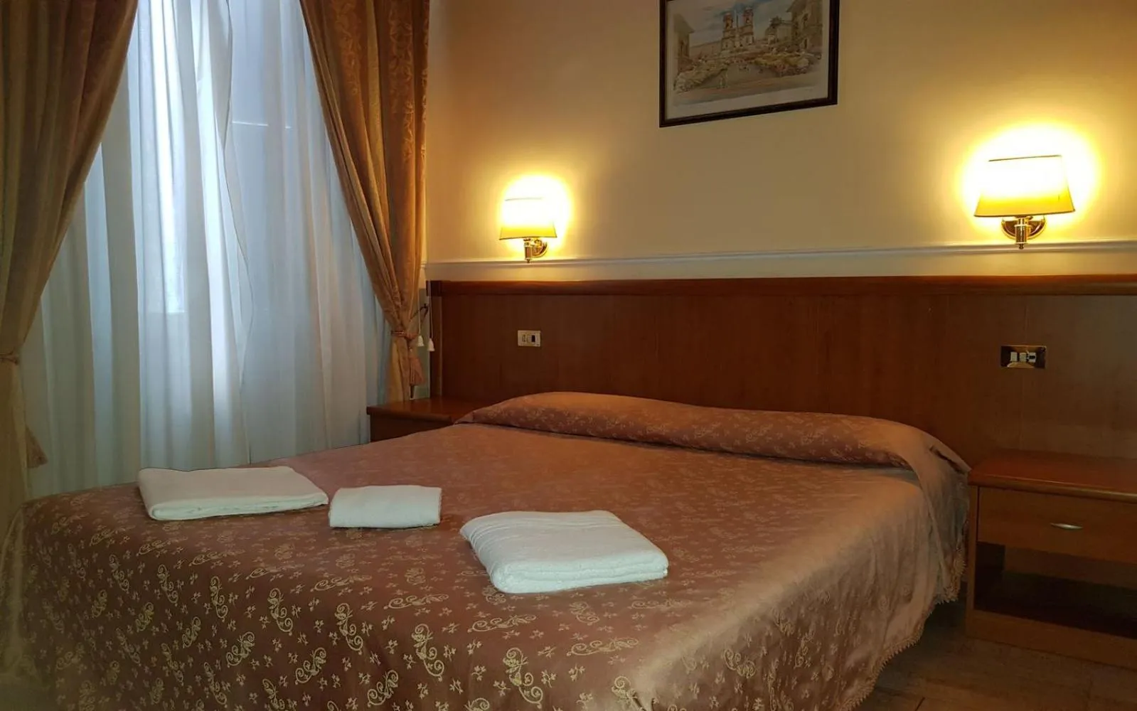 Bed in Hotel Aristotele