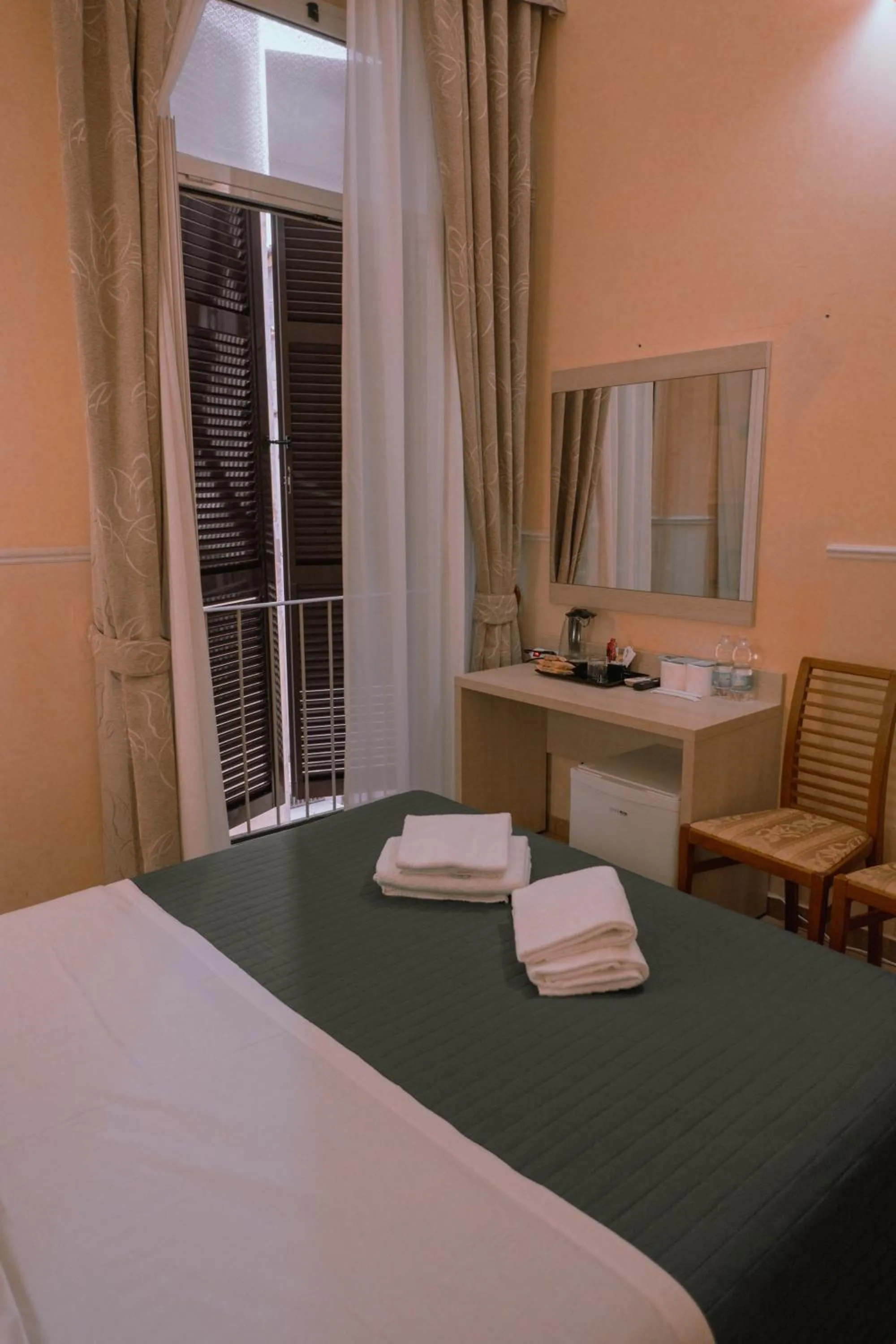 Bed in Hotel Aristotele