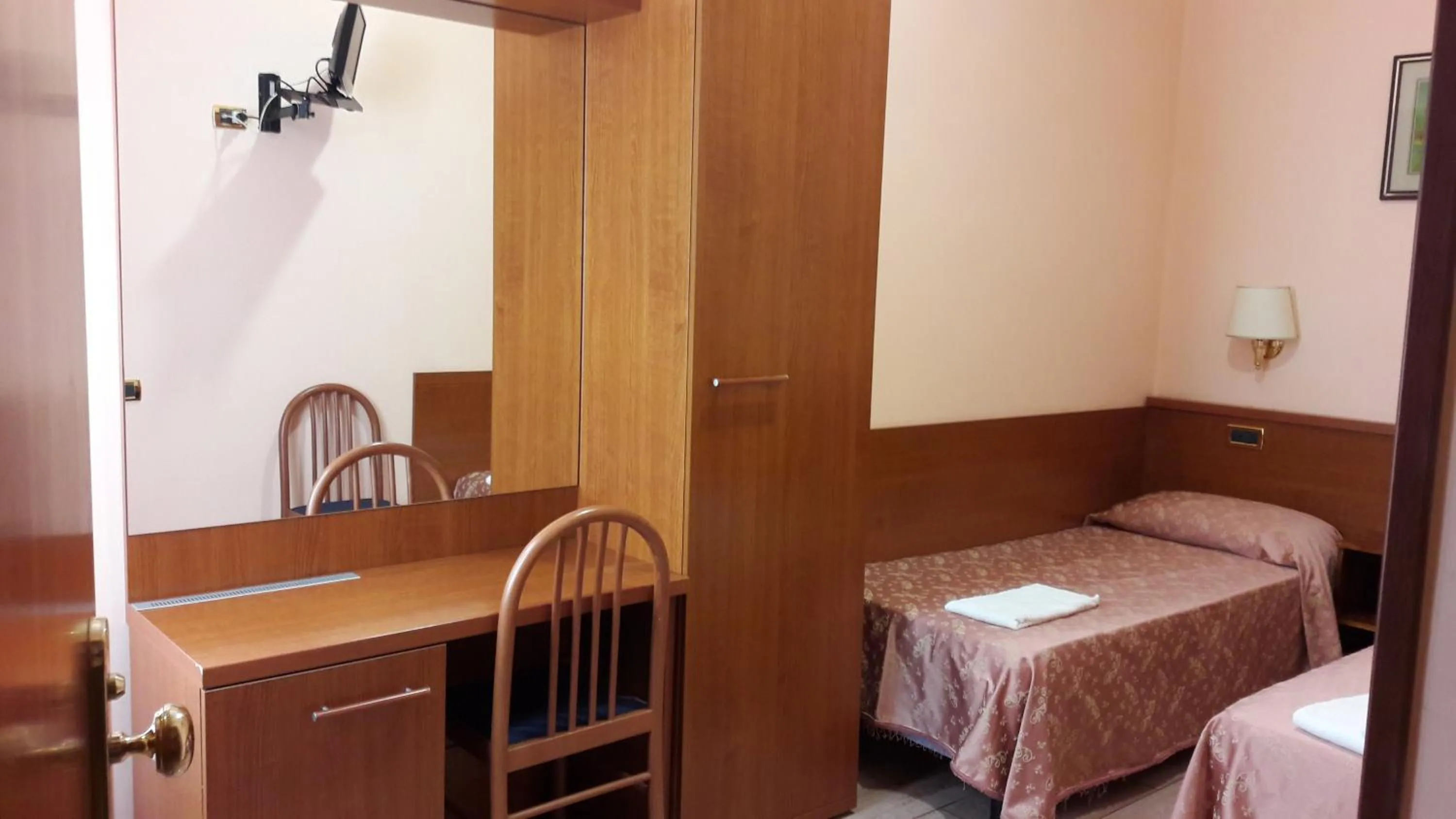 Bed in Hotel Aristotele