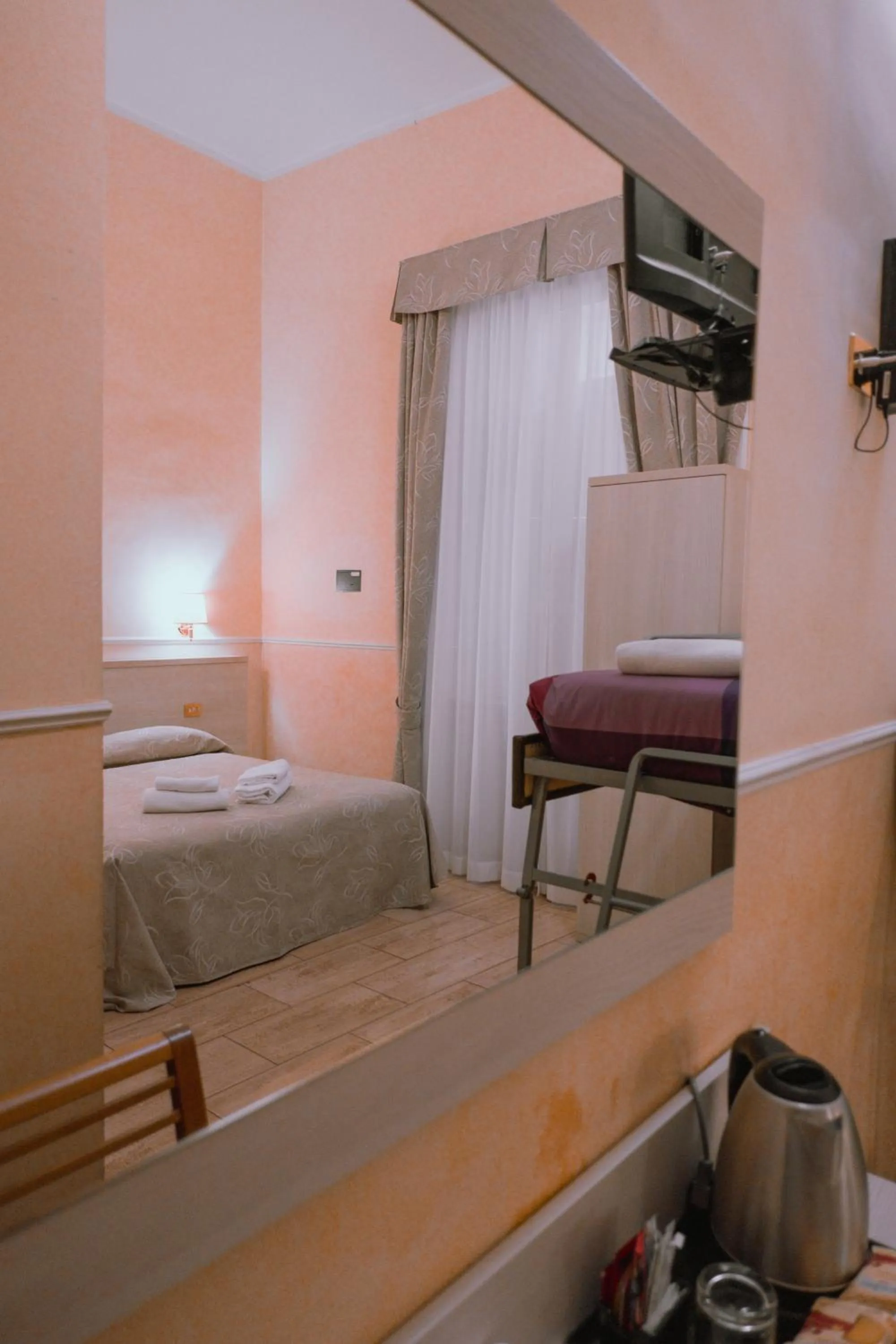 Bed in Hotel Aristotele