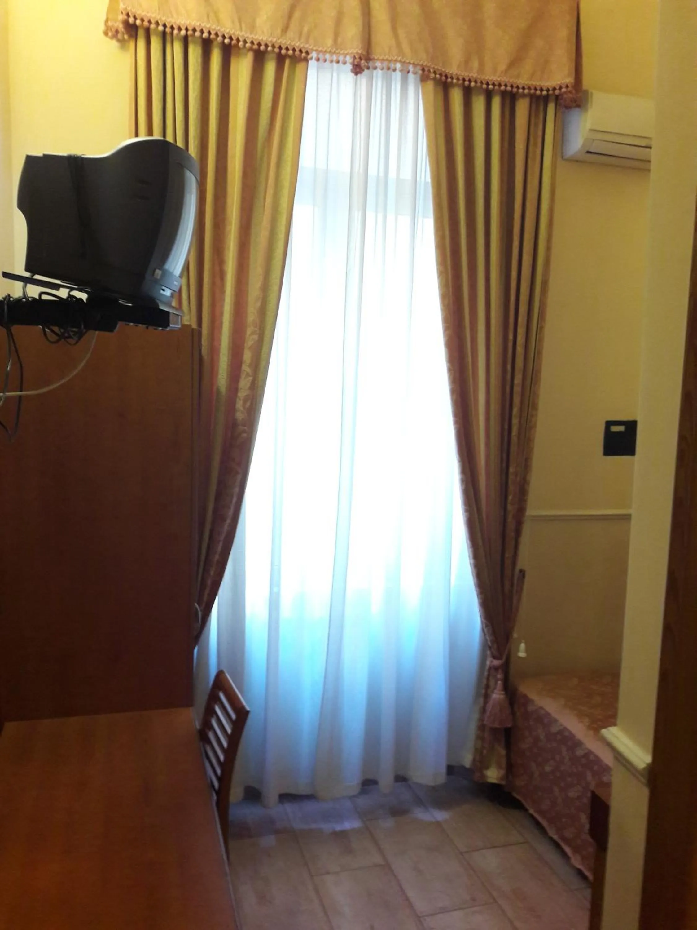 Bed in Hotel Aristotele