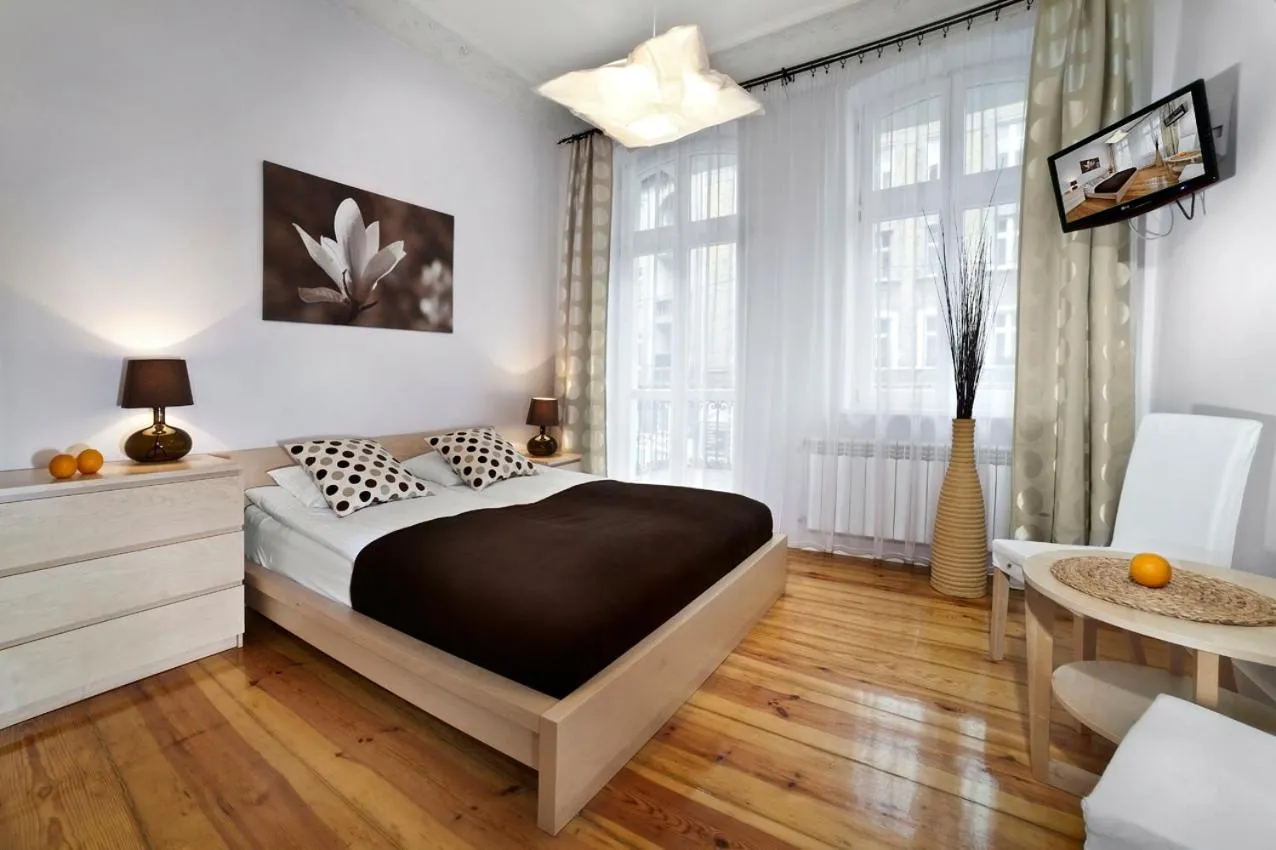 Bed in Apartamenty Pomarańczarnia