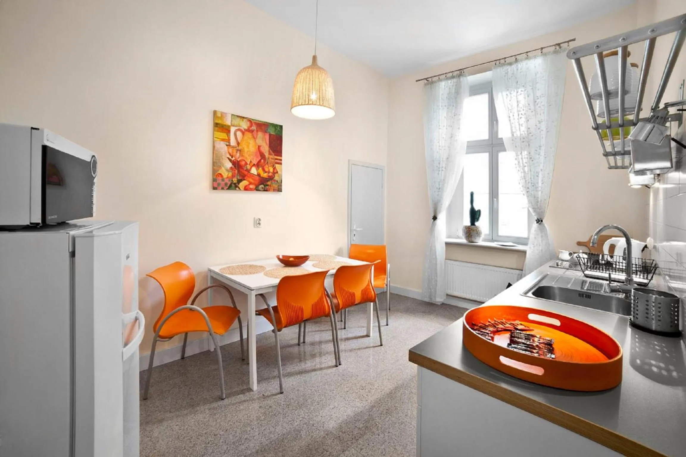 Kitchen or kitchenette in Apartamenty Pomarańczarnia