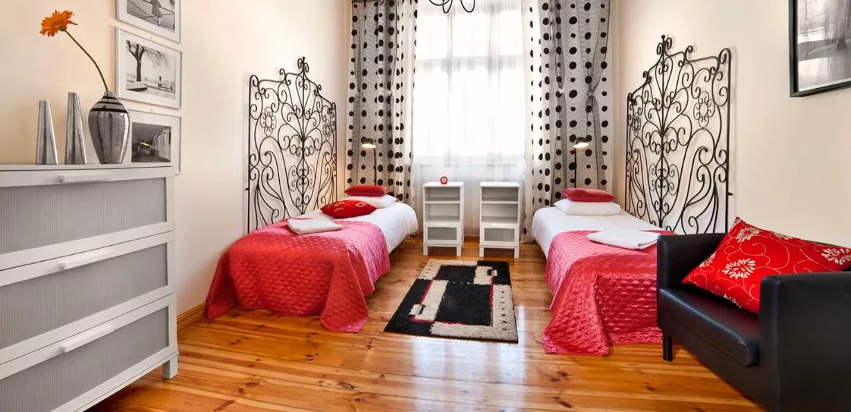 Bed in Apartamenty Pomarańczarnia